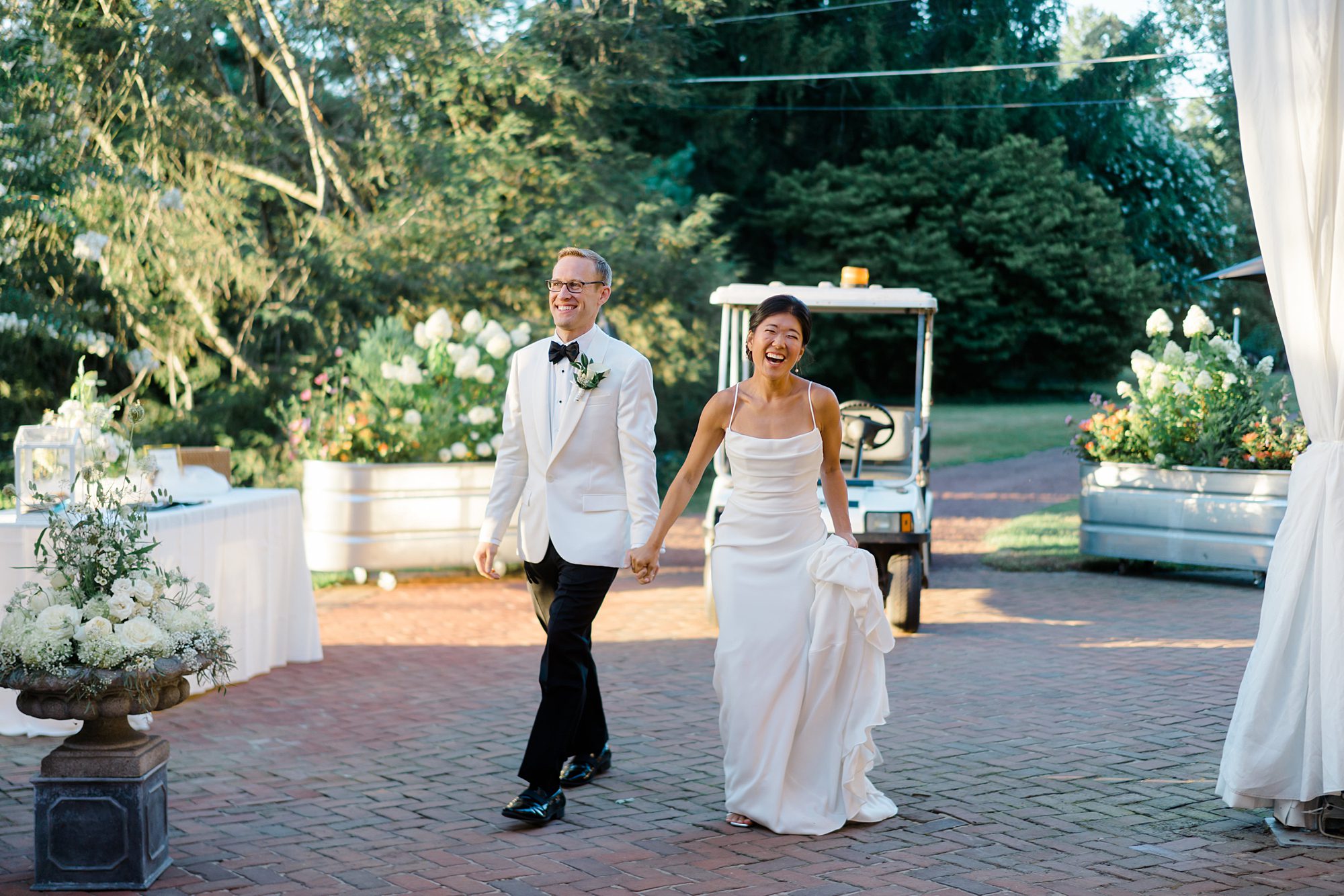 newlyweds walk to reception