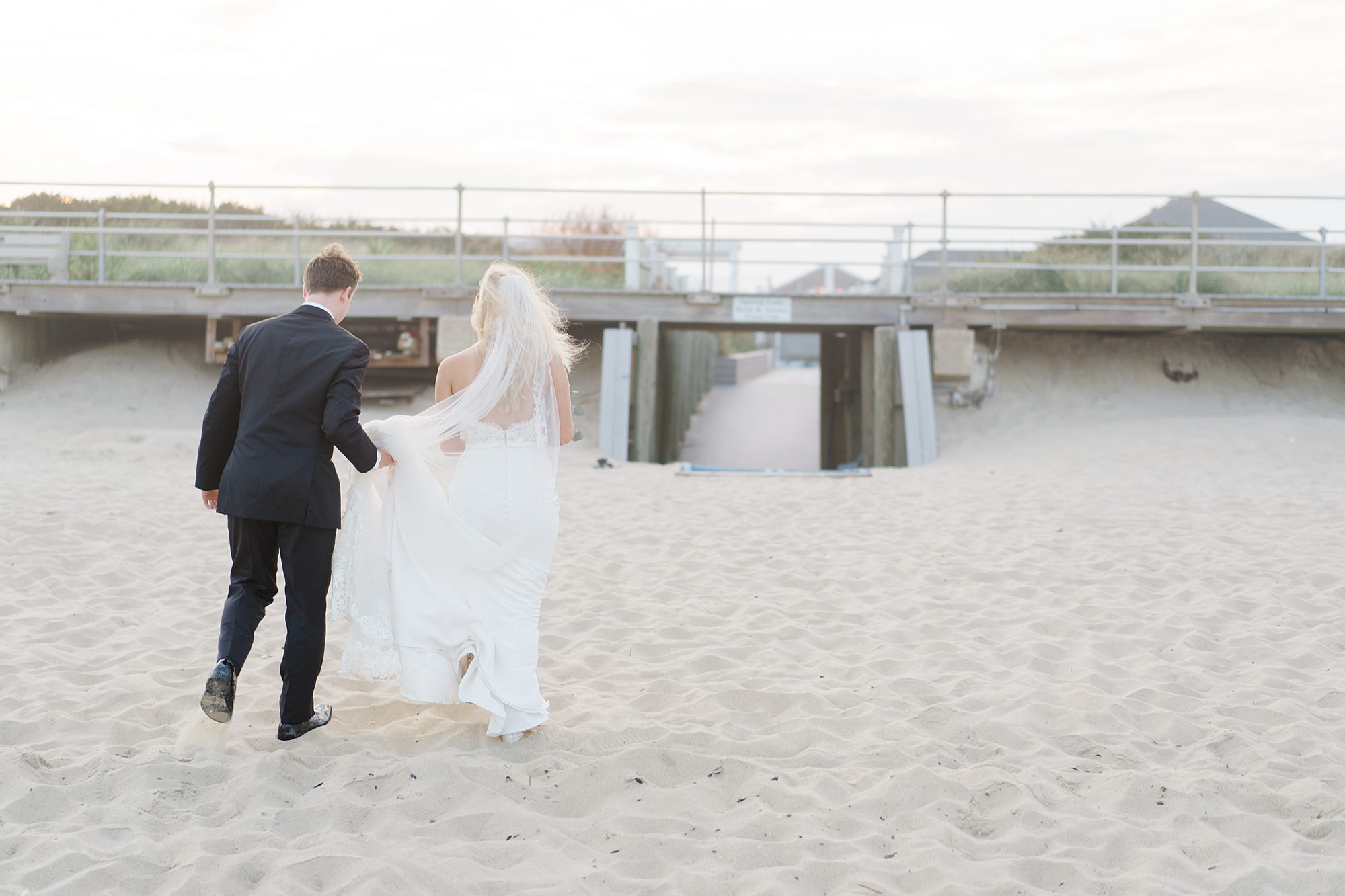 couple on the beach after Elegant Jersey Shore Wedding at Spring Lake Bath and Tennis Club