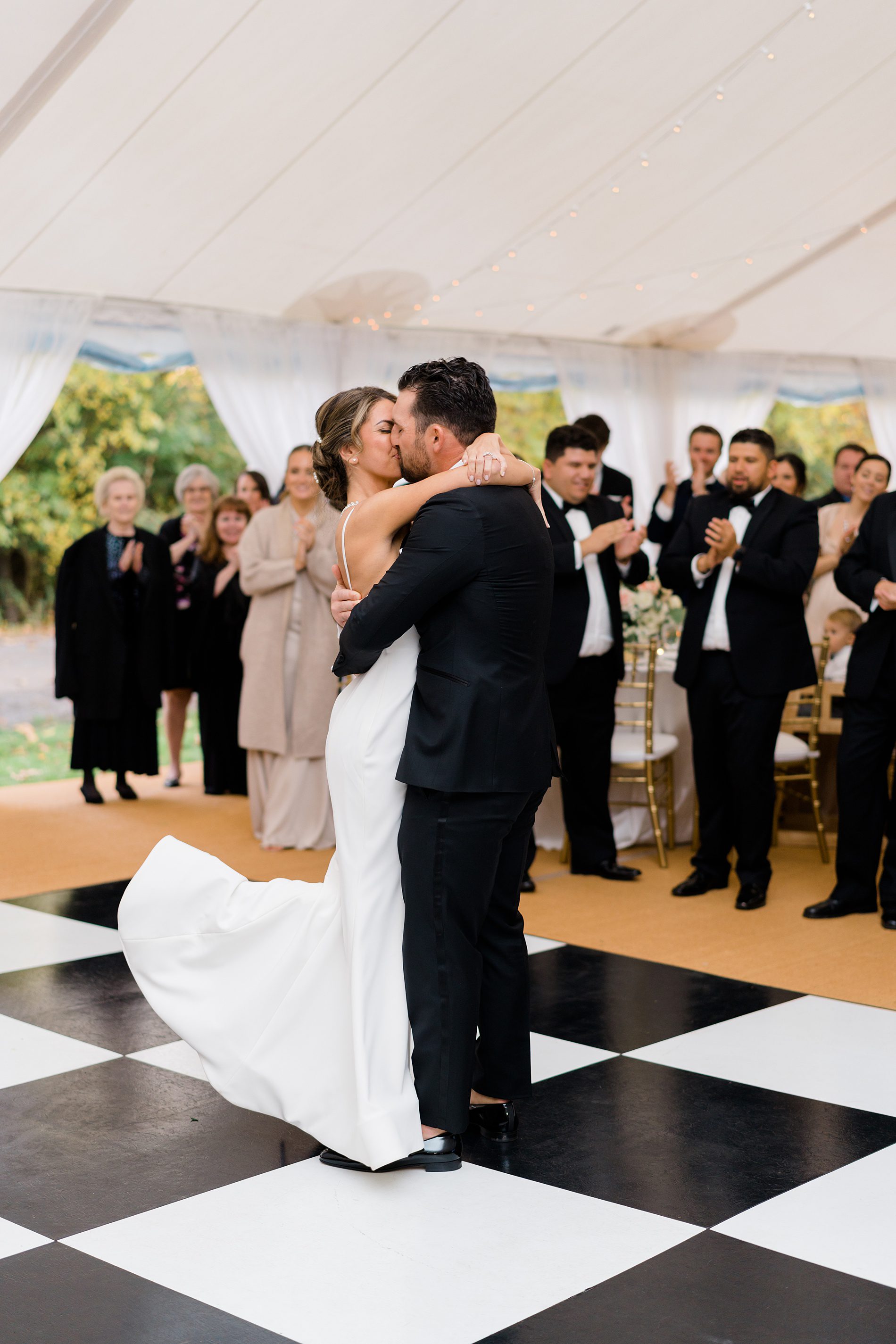 couple kiss on the dance floor at Cross Gables Estate wedding