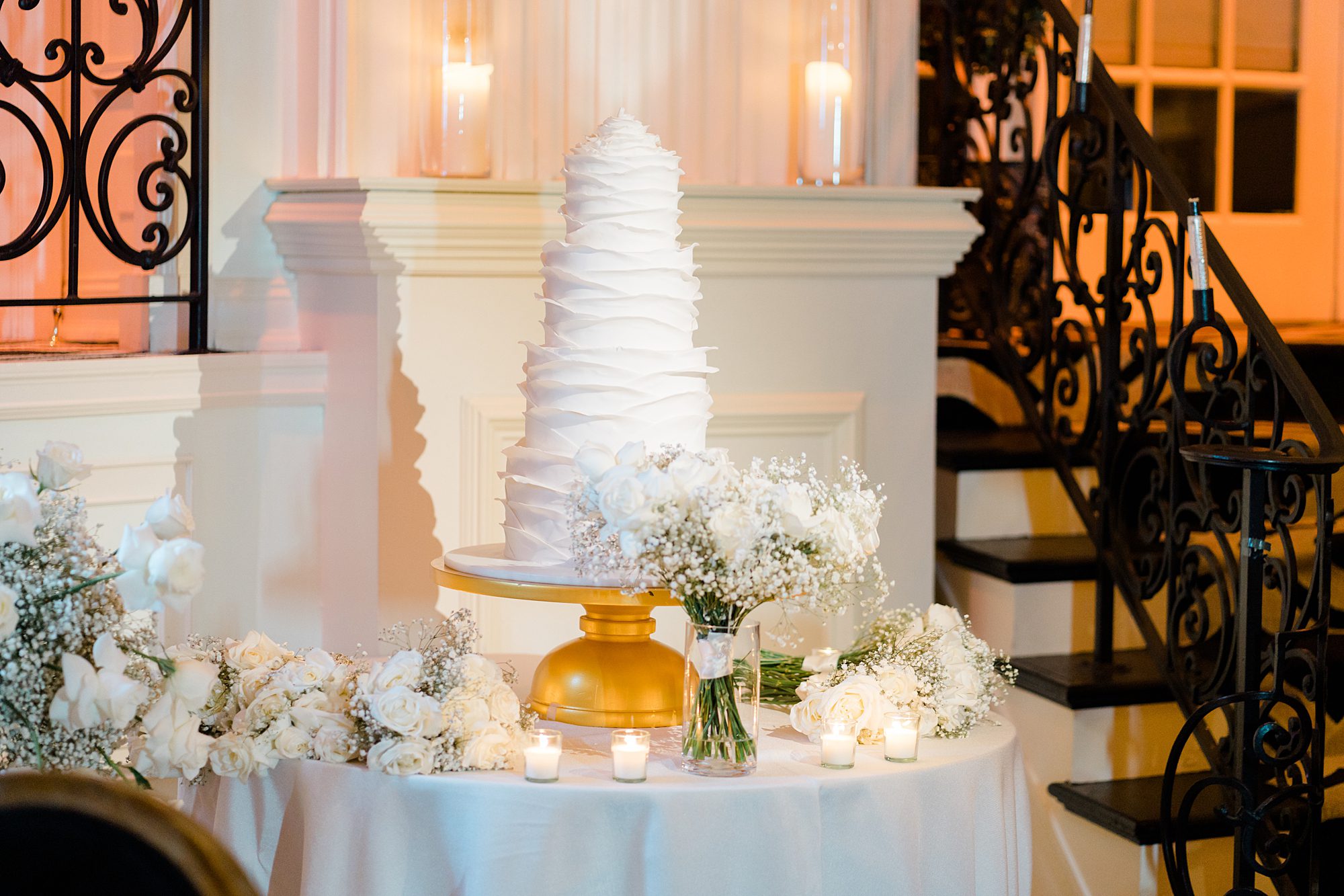 four tiered white wedding cake from Cescaphe Ballroom Winter Wedding