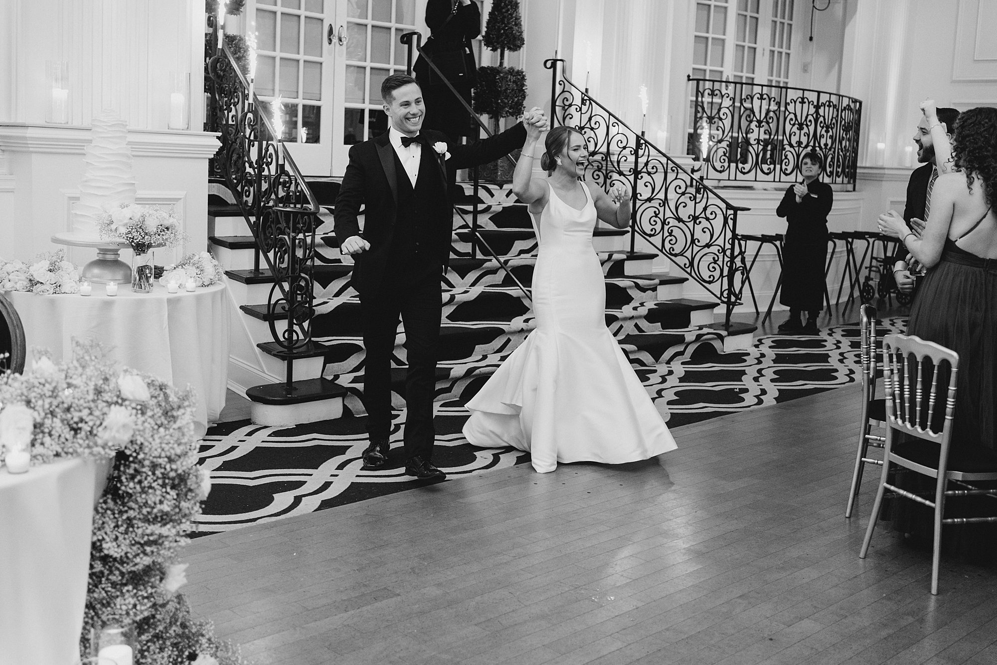 newlyweds make grand entrance to reception