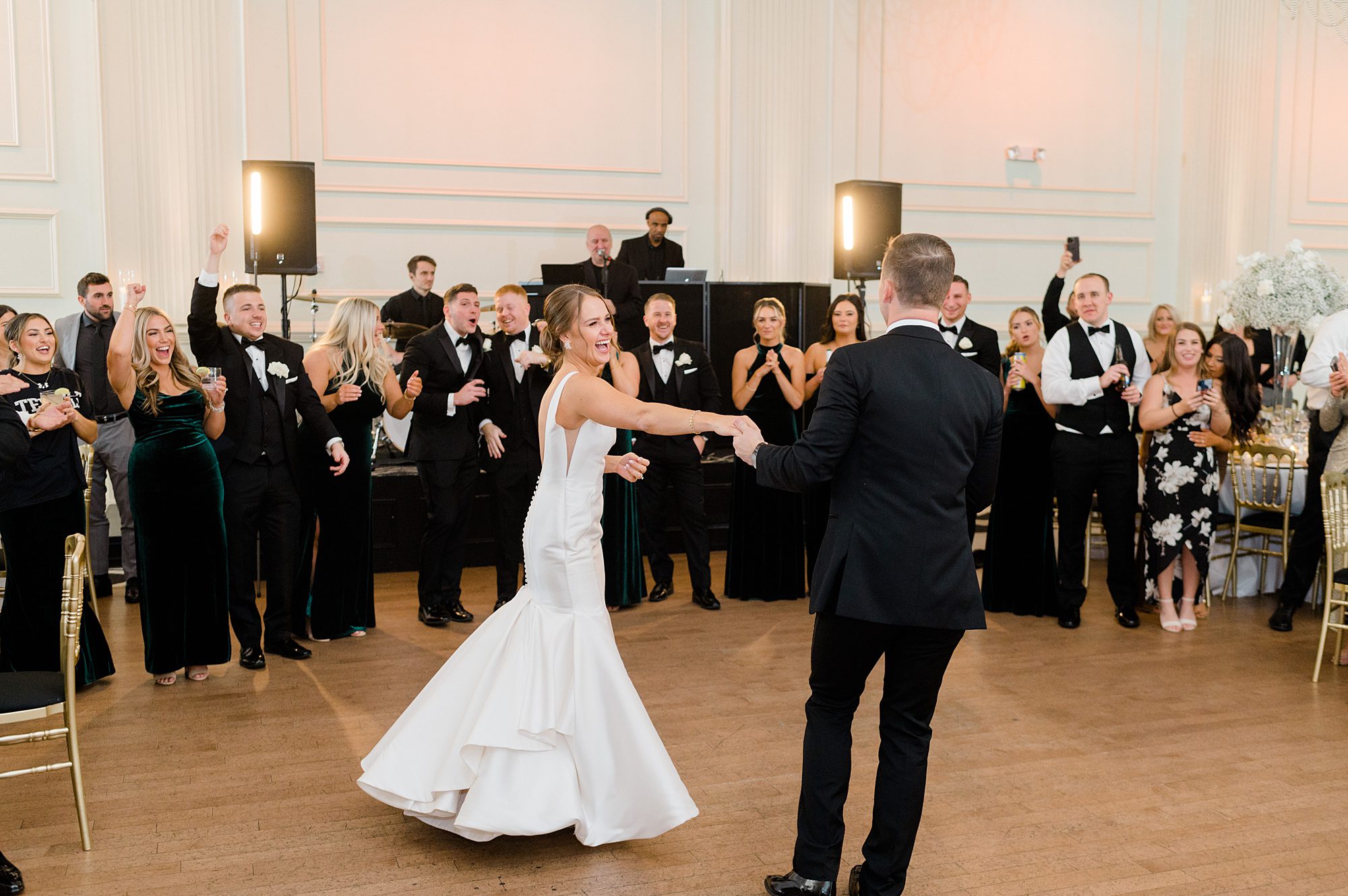 newlyweds dance at Cescaphe Ballroom Winter Wedding reception