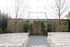 wedding arch at outdoor ceremony at Terrain Gardens at Devon Yard