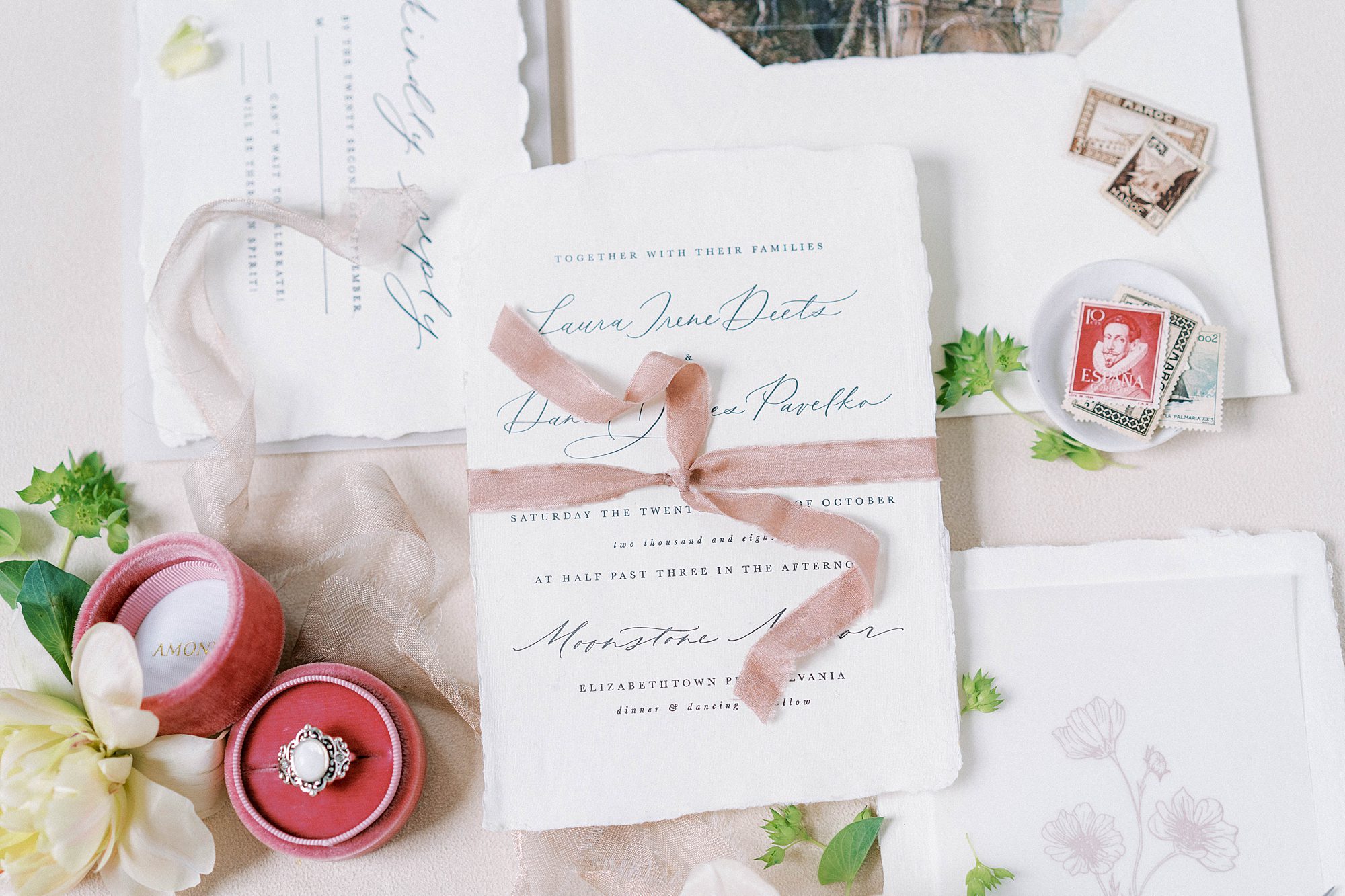 flat lay wedding details with ring box
