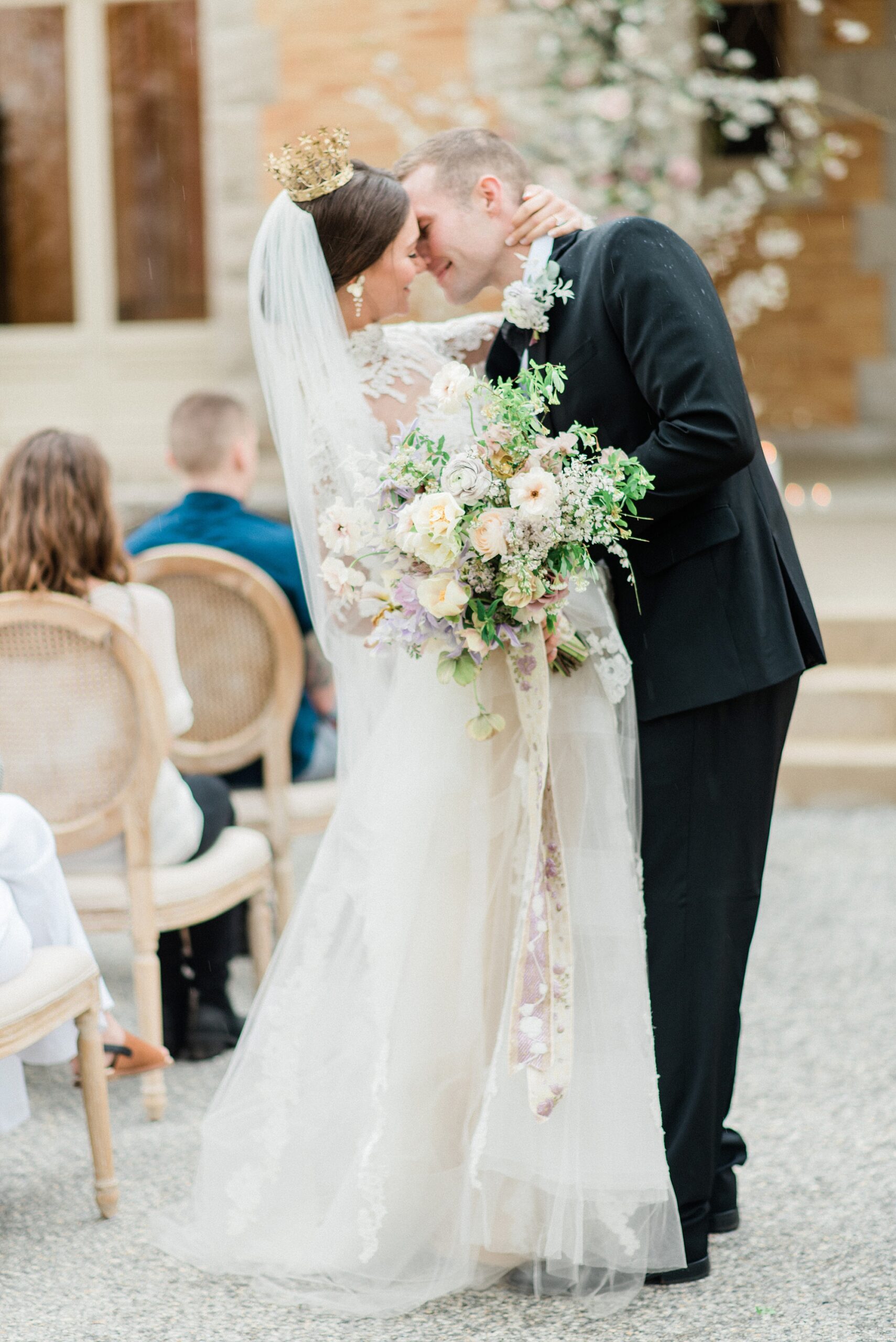 newlyweds kiss exiting wedding ceremony