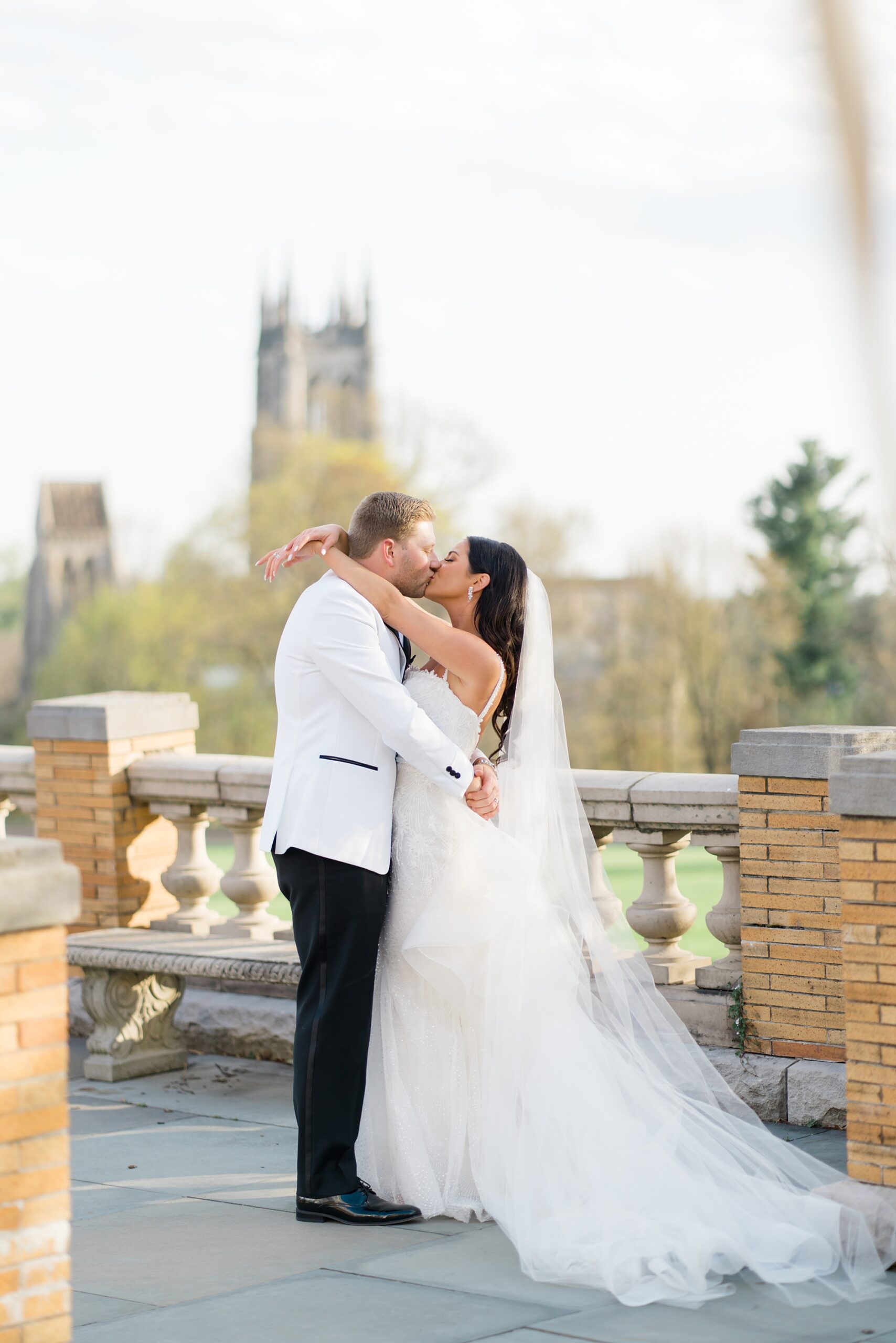couple kiss during wedding portraits | 5 Tips for Crafting a Wedding Day Timeline