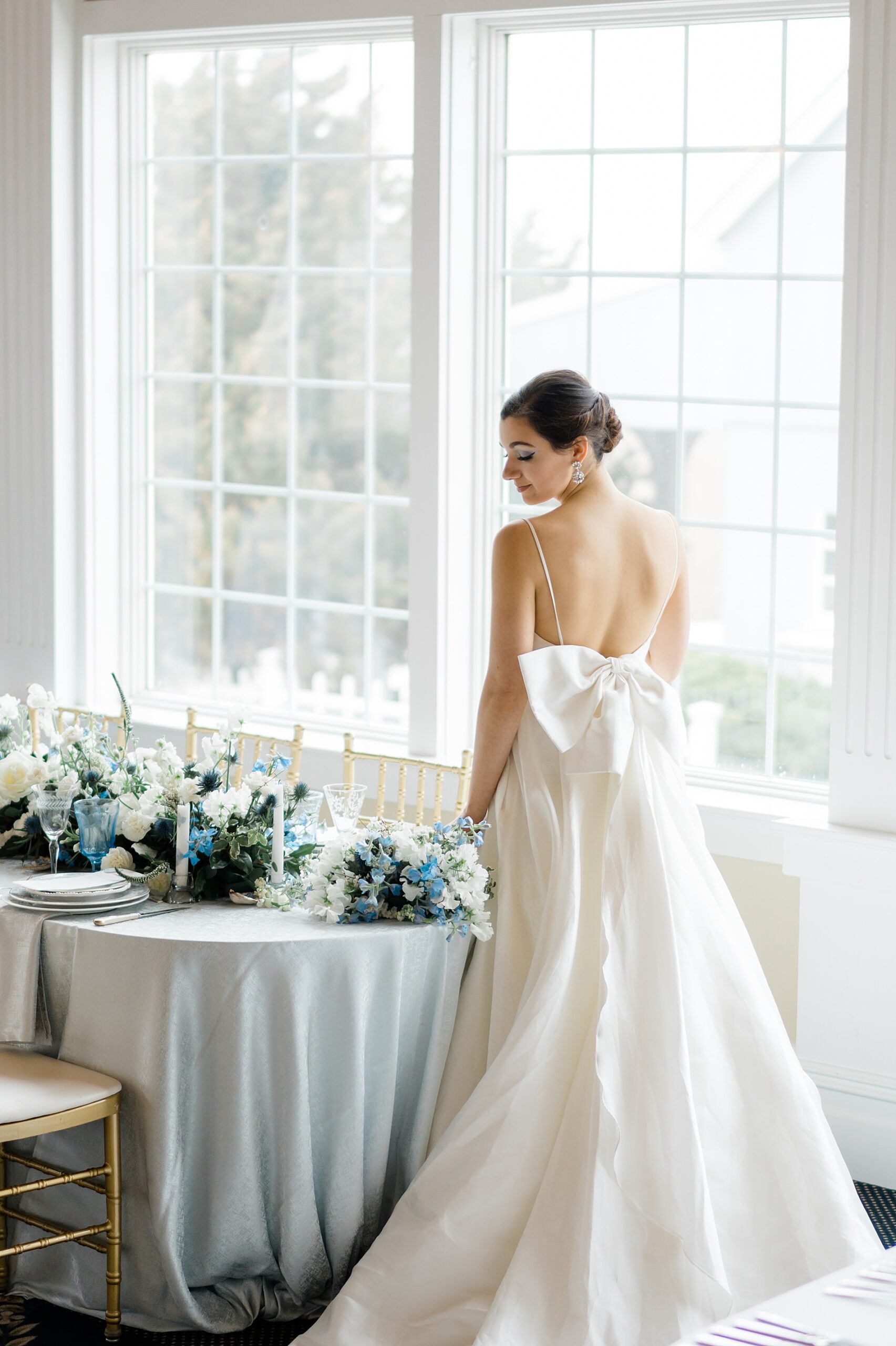 back of bride's wedding dress featuring bow detail