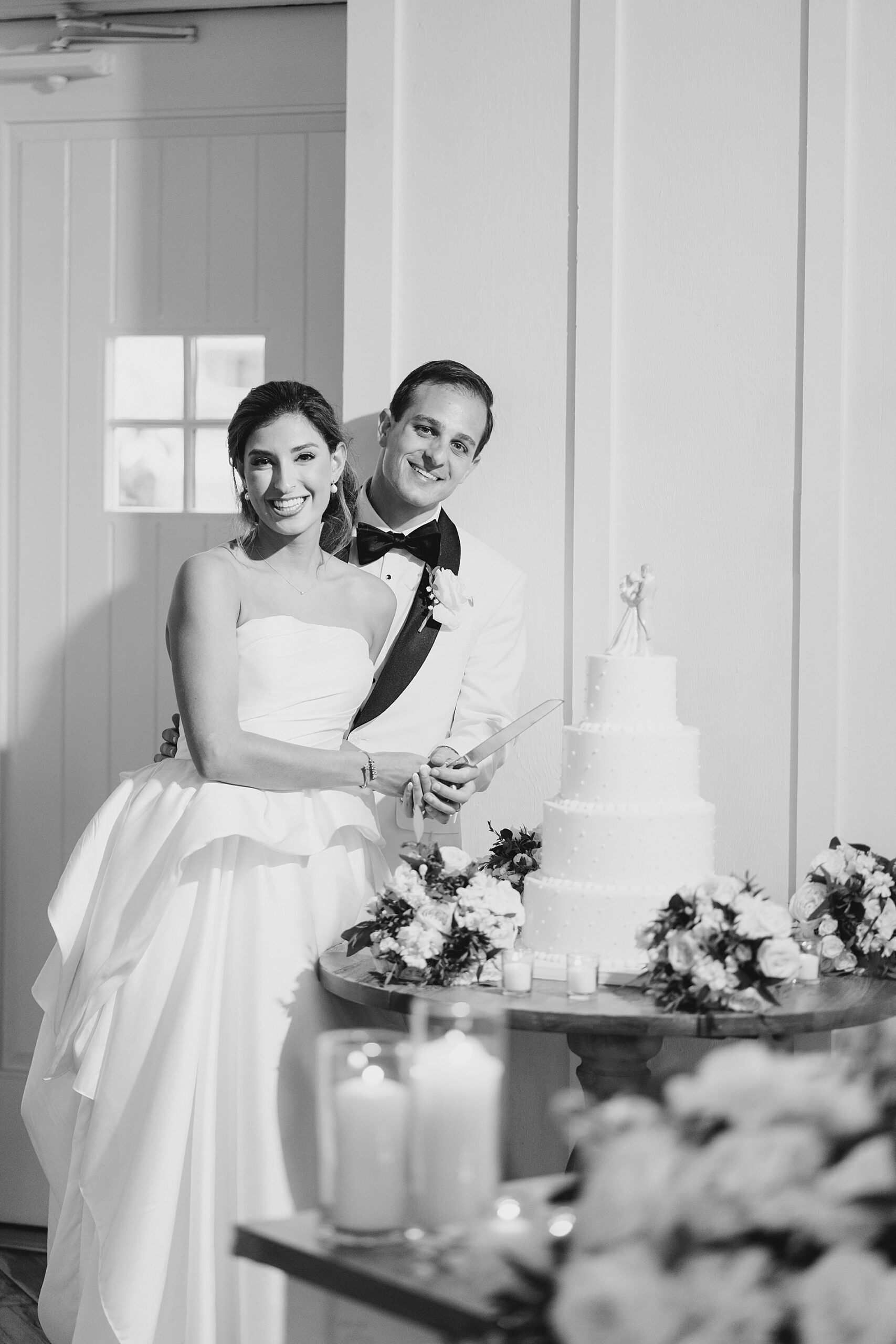couple with their wedding cake