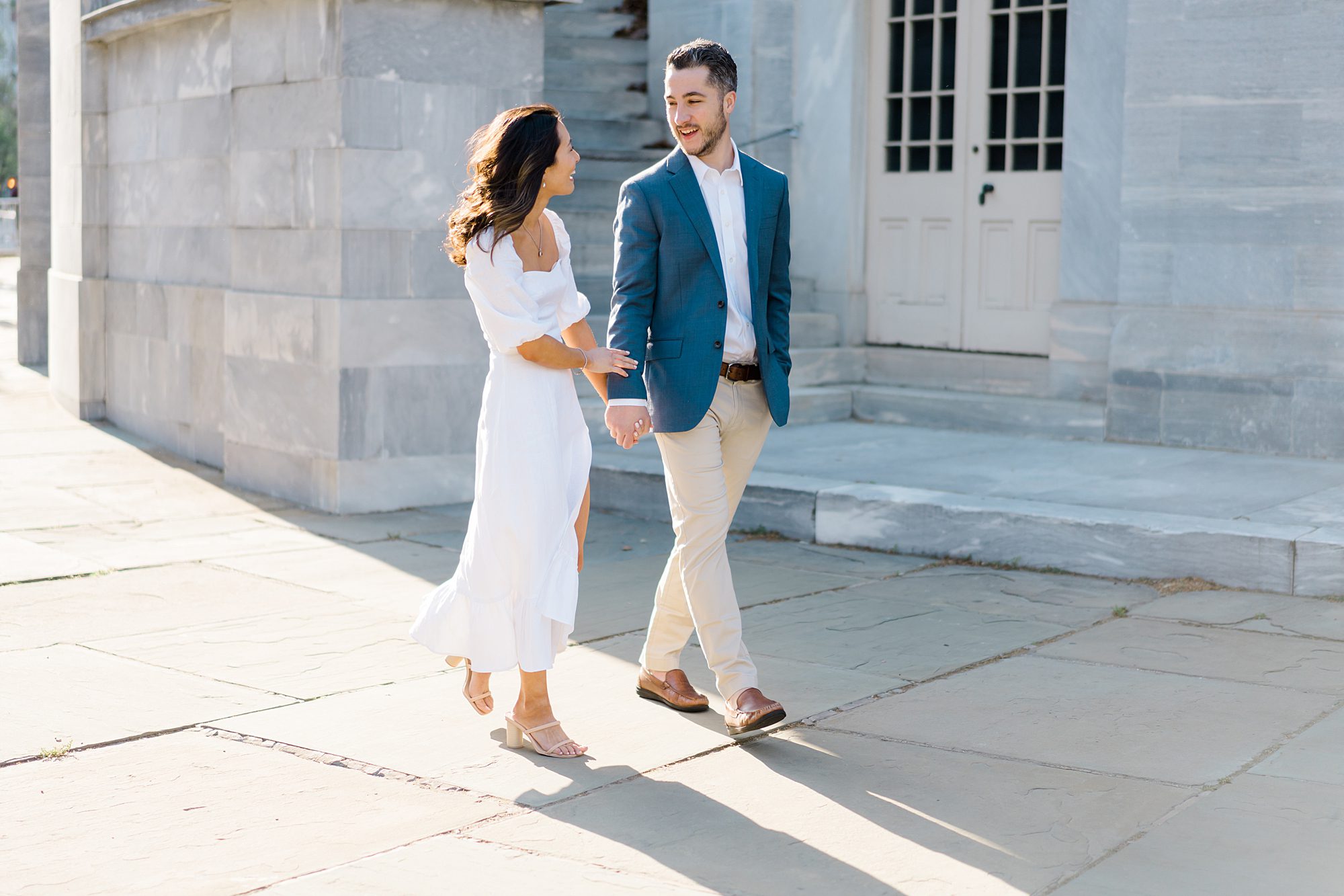 engaged couple holding hands during Romantic Old City Philadelphia Engagement Session