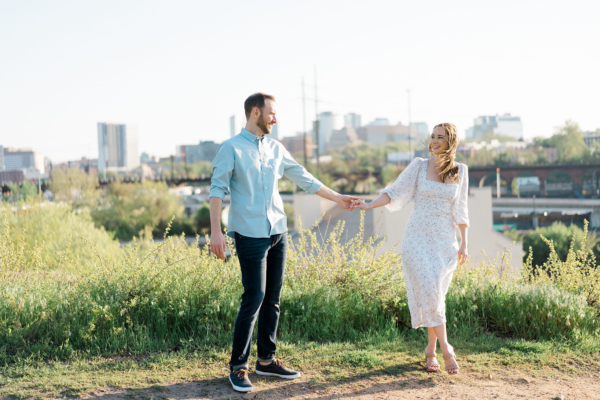 Light + Airy Philadelphia Engagement with the skyline in the background