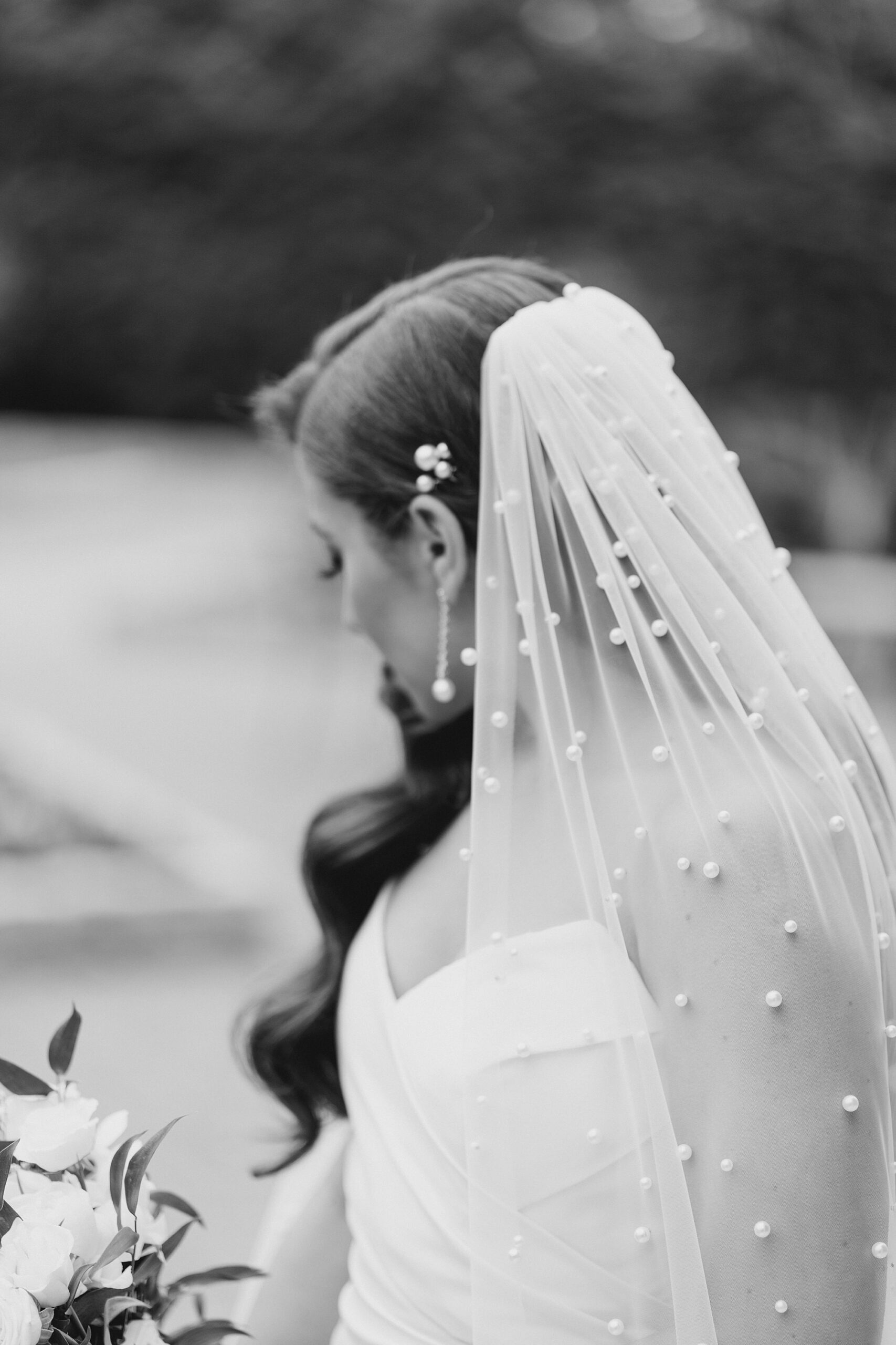 bride with pearl studded veil