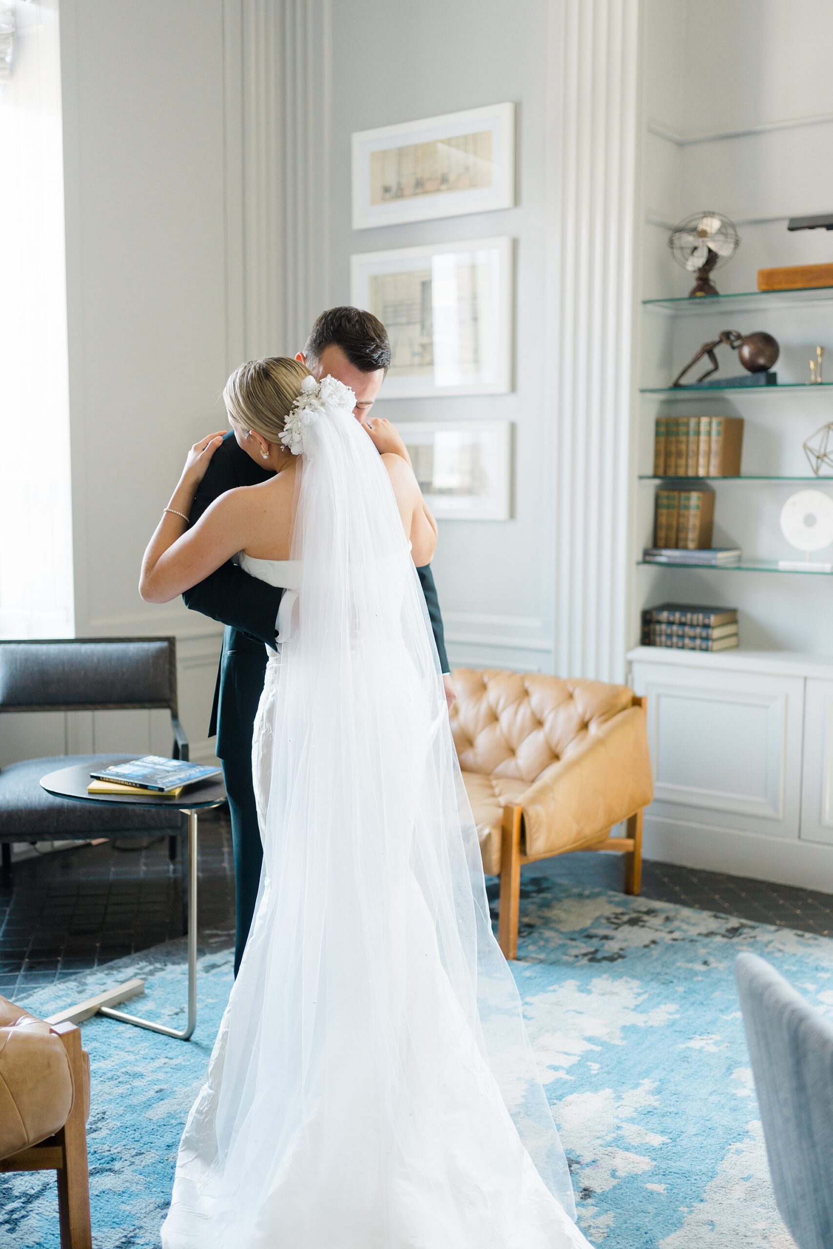 bride and groom hug during first look moment