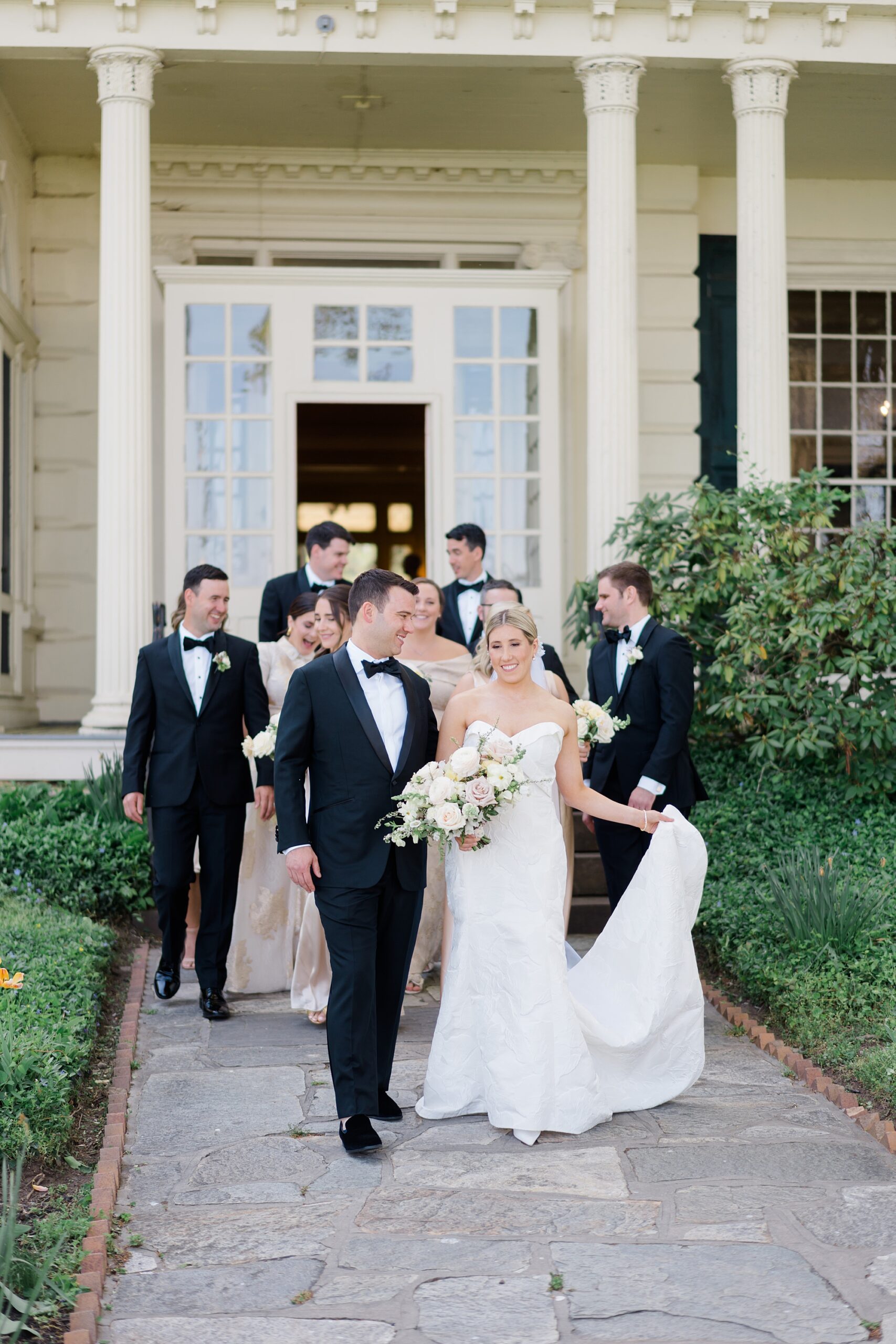 wedding party in front of Estate at Glen Foerd on the Delaware