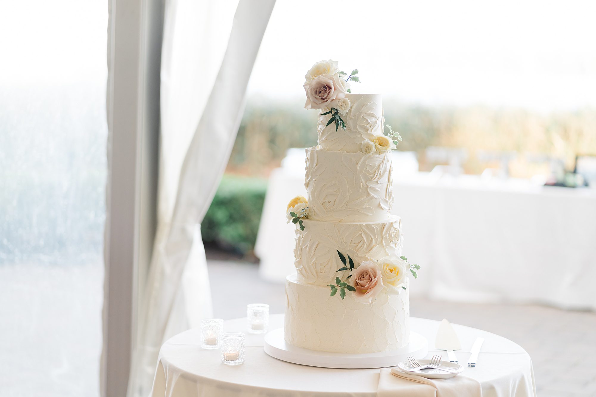 4 tiered wedding cake from Chic Garden Wedding at Glen Foerd on the Delaware