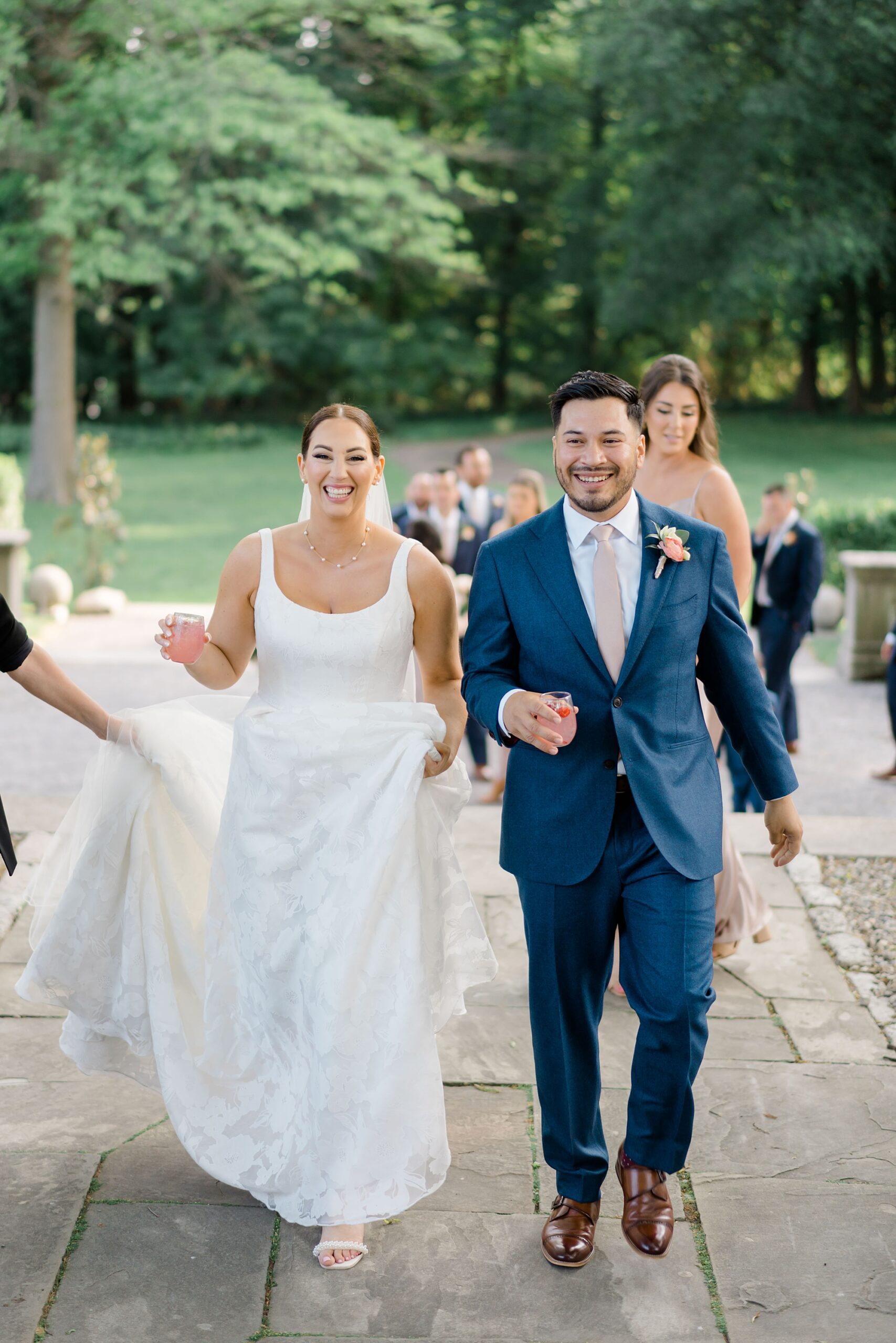 newlyweds smile as they exit wedding ceremony 