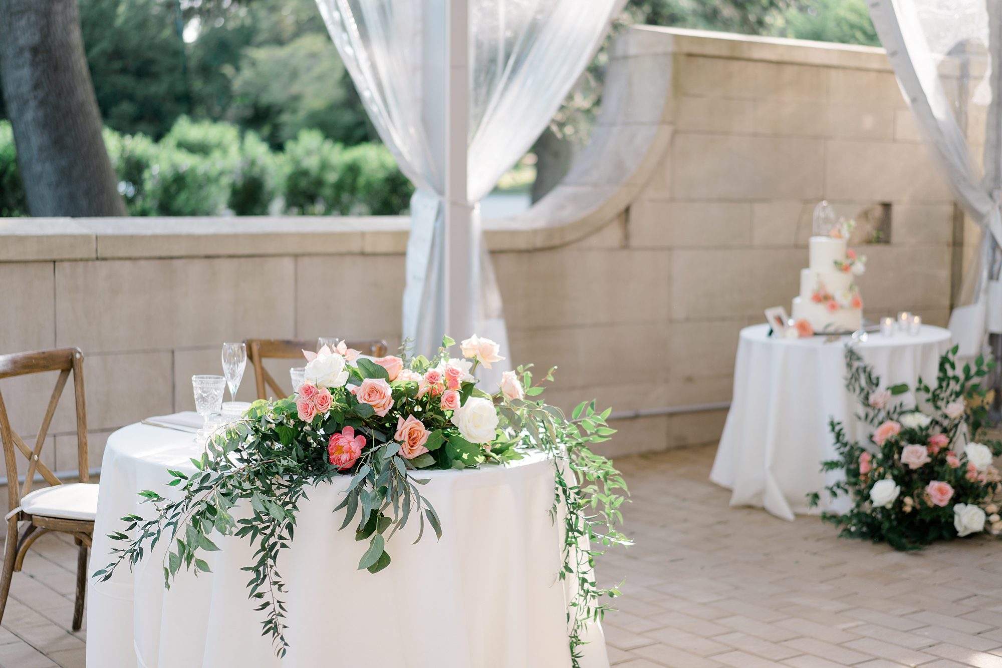 romantic florals decorate Curtis Arboretum outdoor tented Wedding reception 