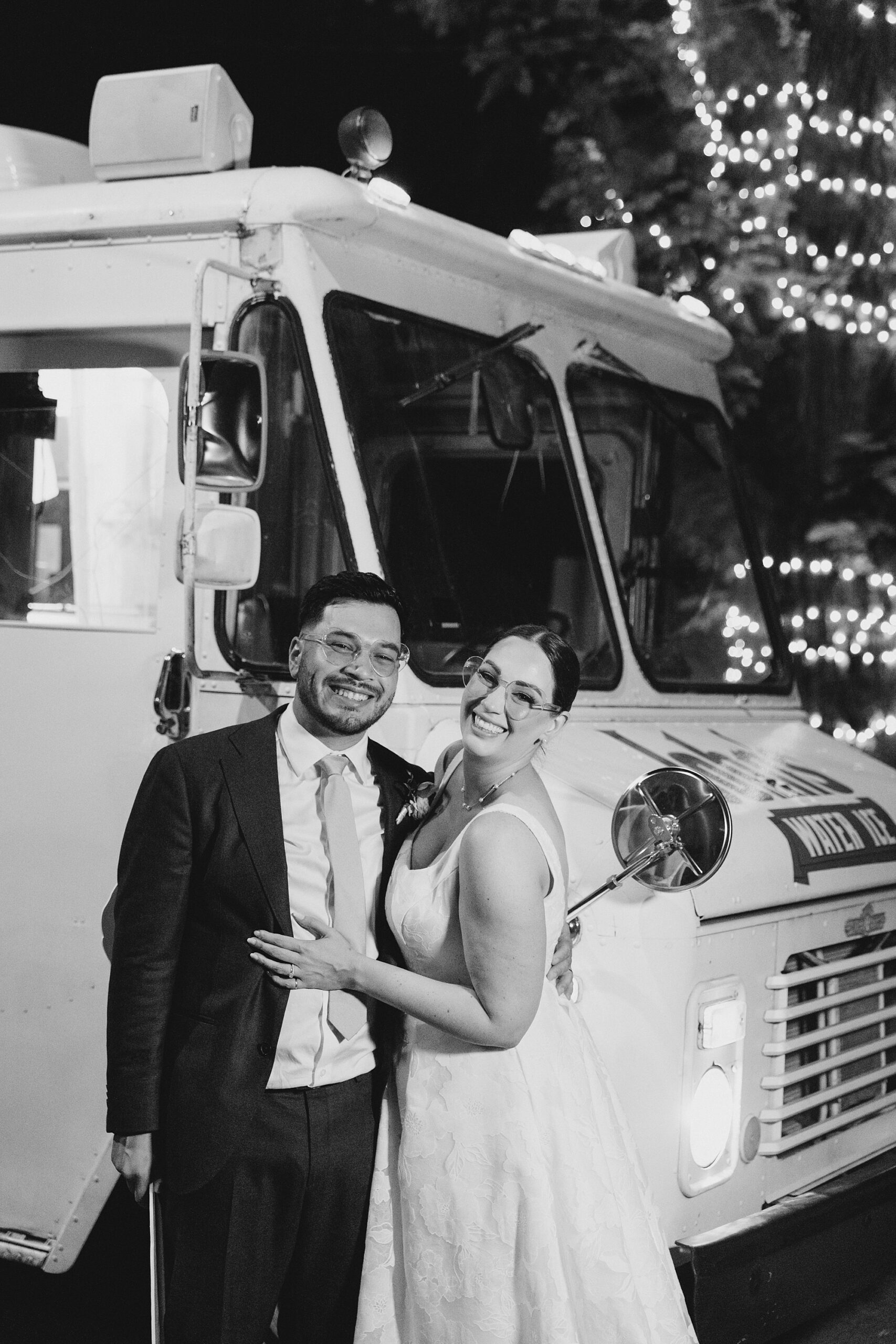 newlyweds in front of ice cream truck 