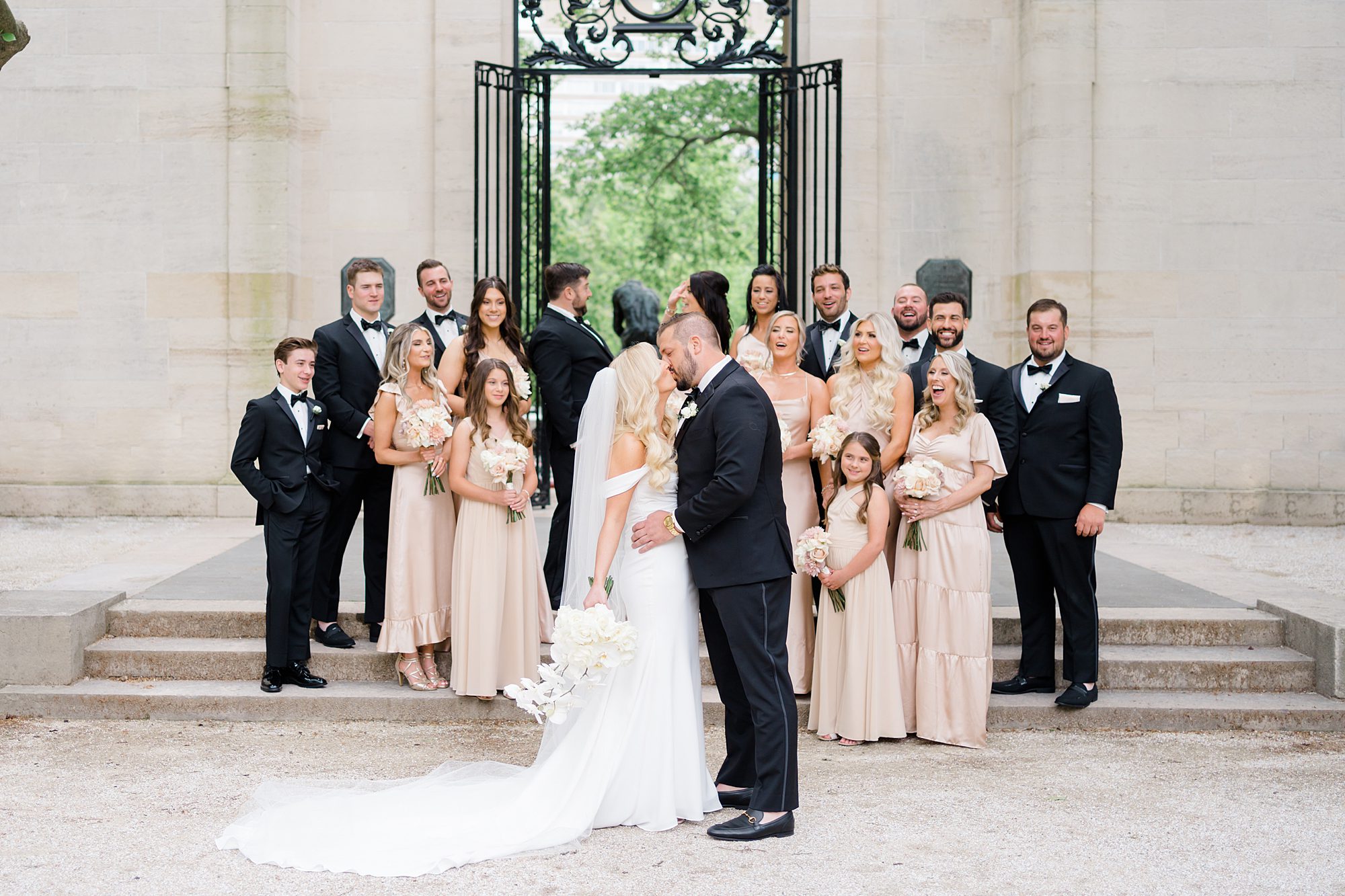 wedding party portraits on steps of Rodin Museum 