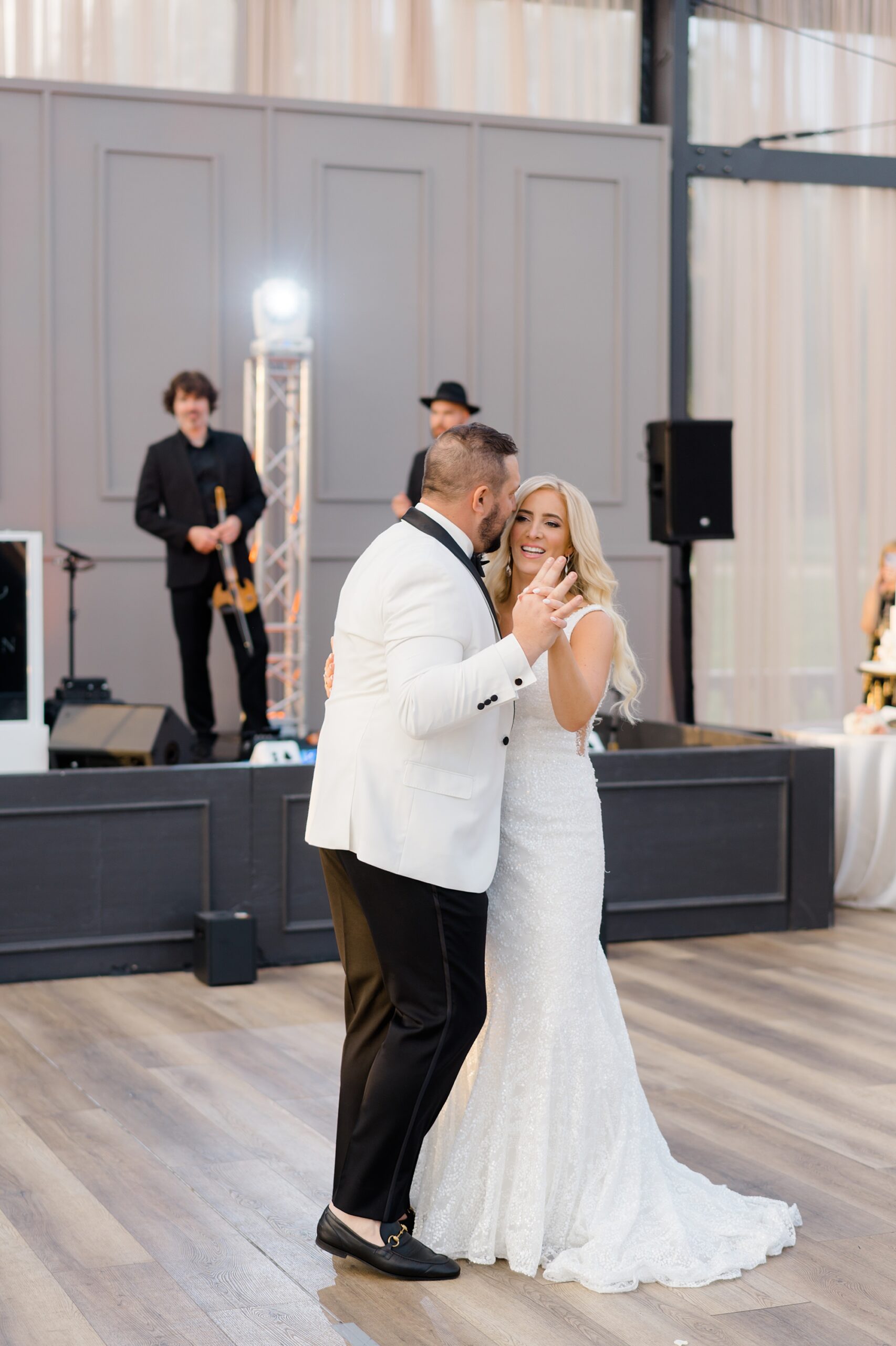 bride and groom share first dance together 