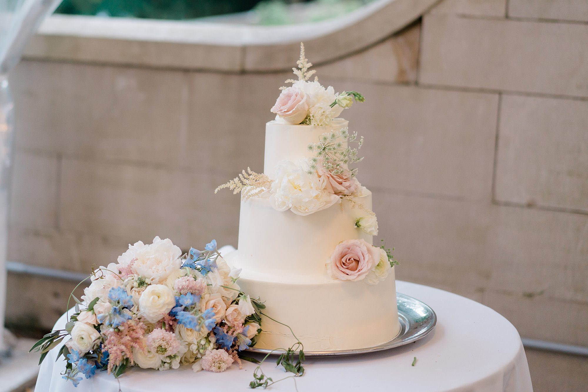 wedding cake decorated with summer flowers