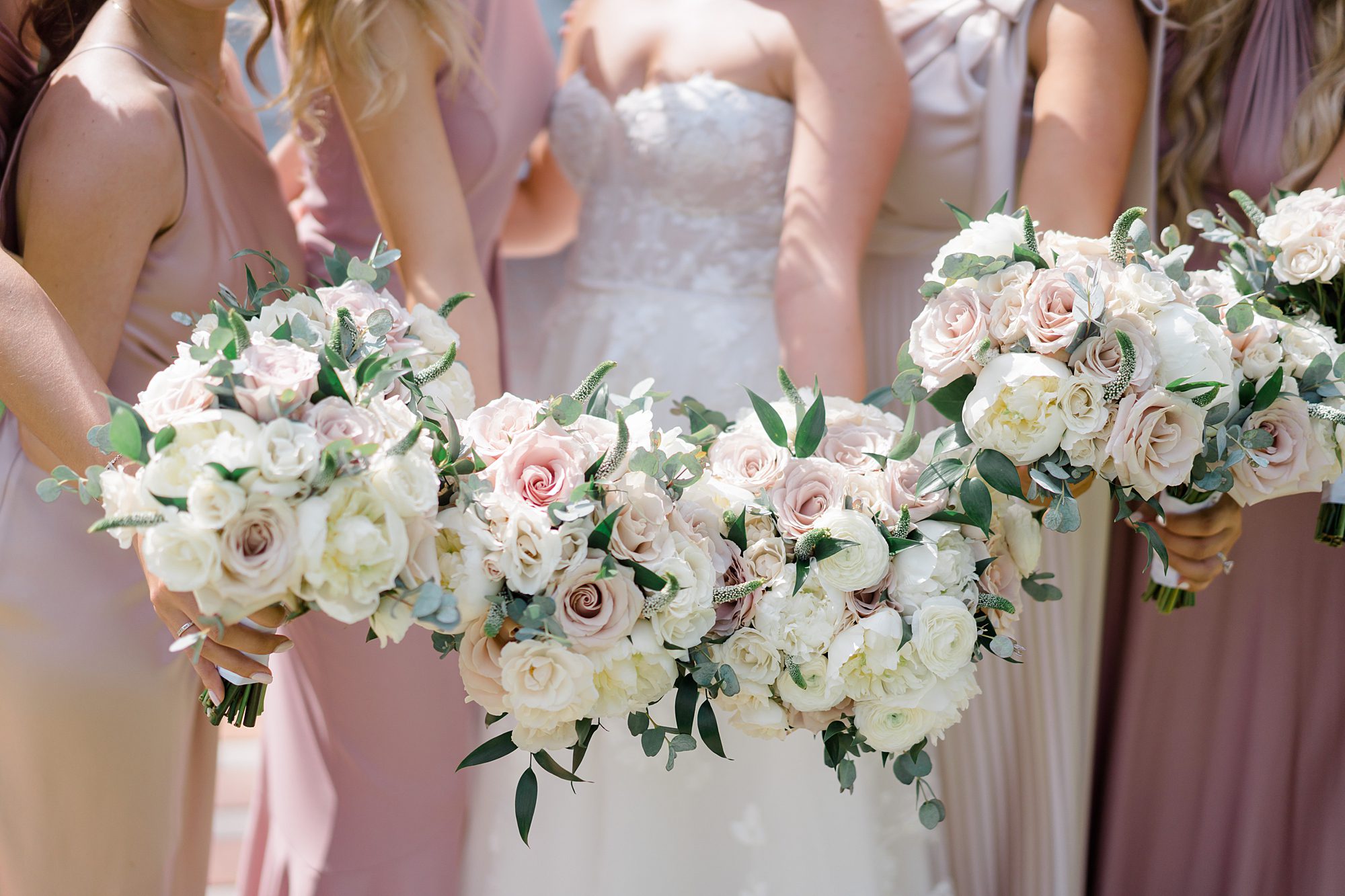 Romantic Wedding bouquets in white and pink roses at The Ryland Inn 
