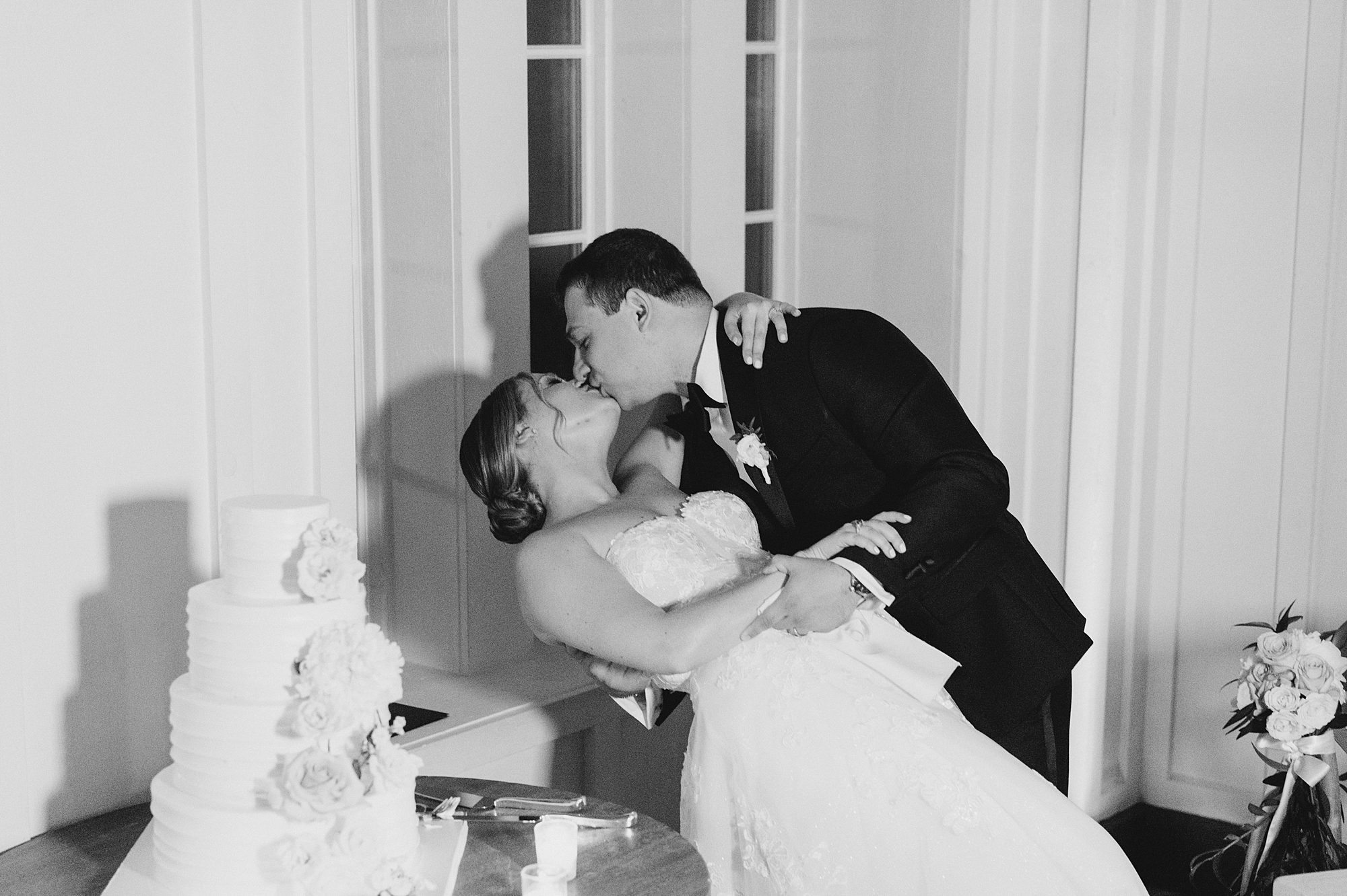 groom kisses his bride 