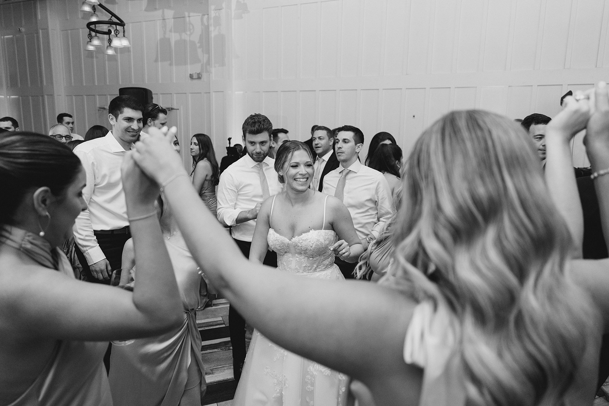wedding guests dance at wedding recepion 
