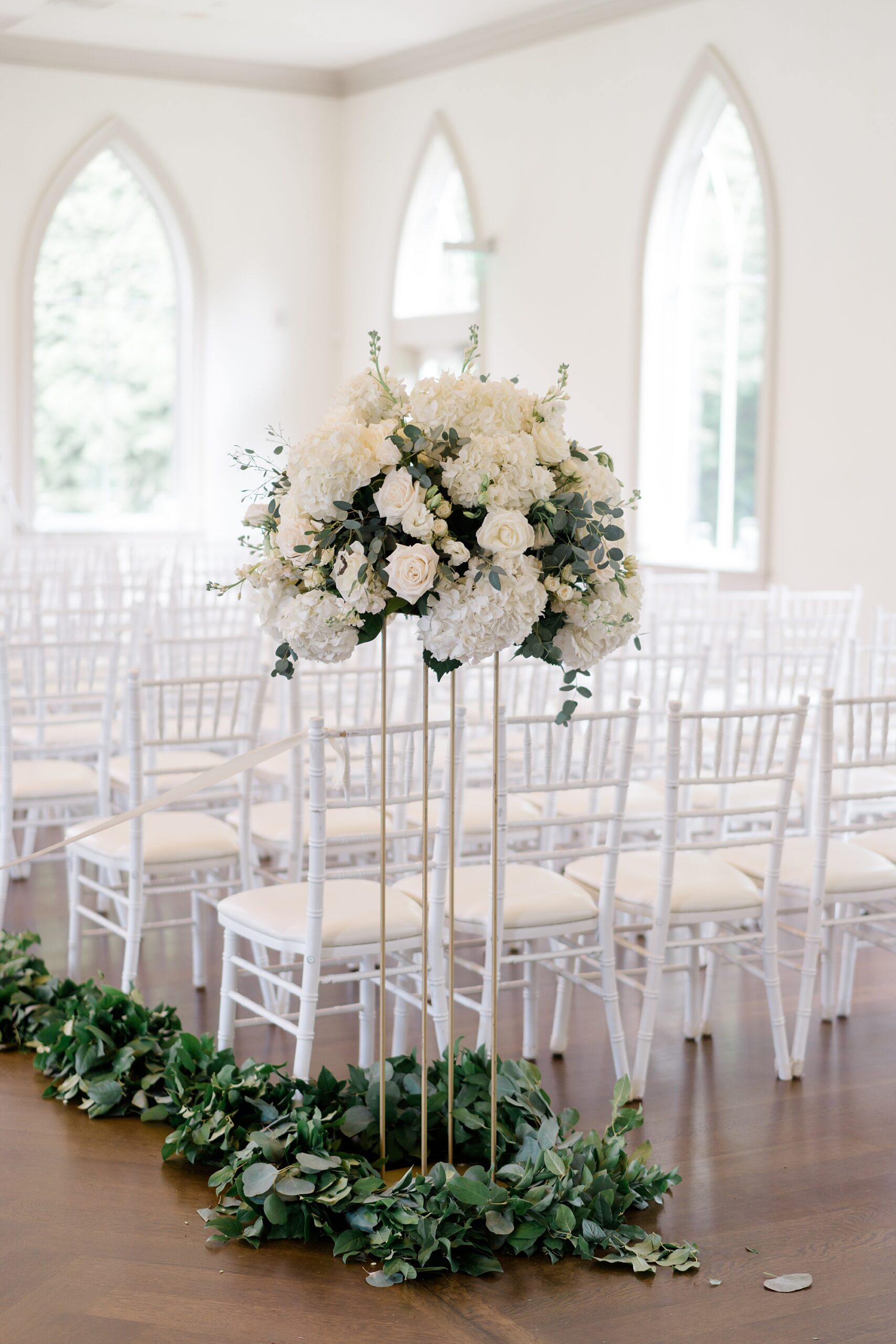 classic white florals at ceremony 