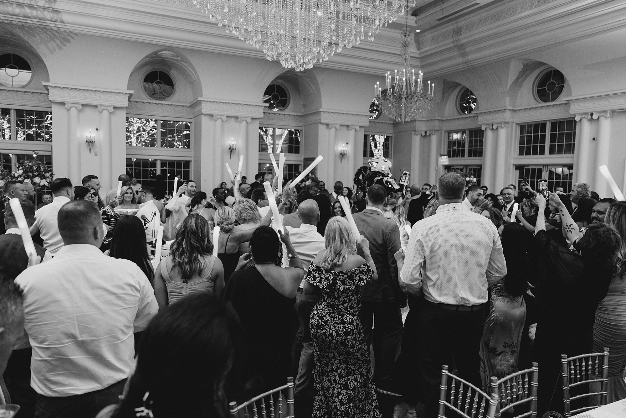 newlyweds and guests dance 