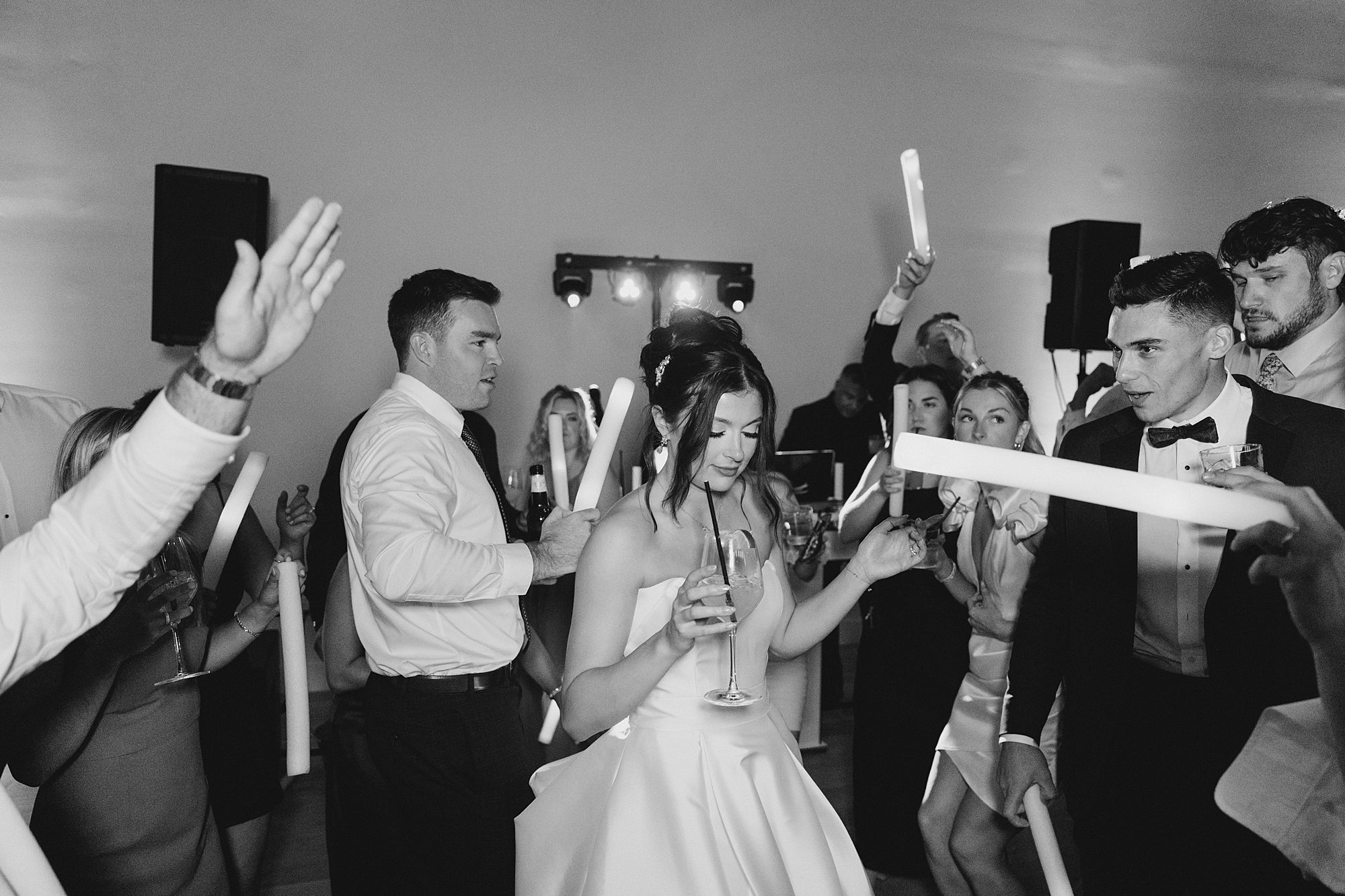 newlyweds dance with guests at Wilbur Mansion Wedding