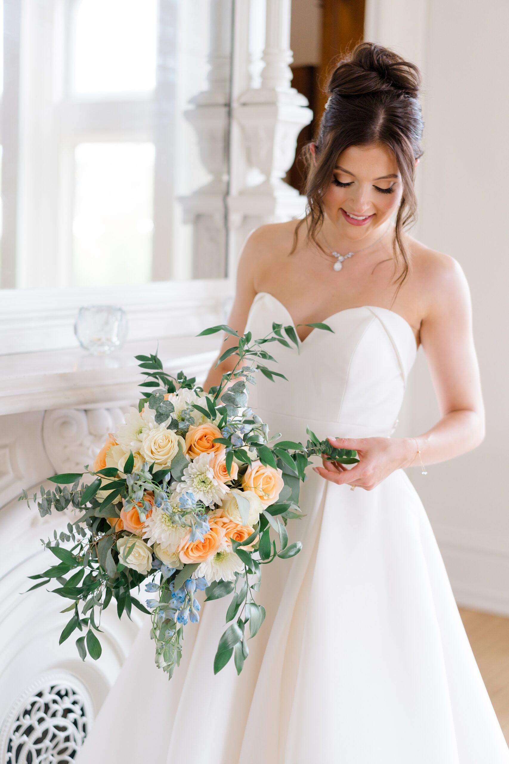 bride holding elegant bridal bouquet 