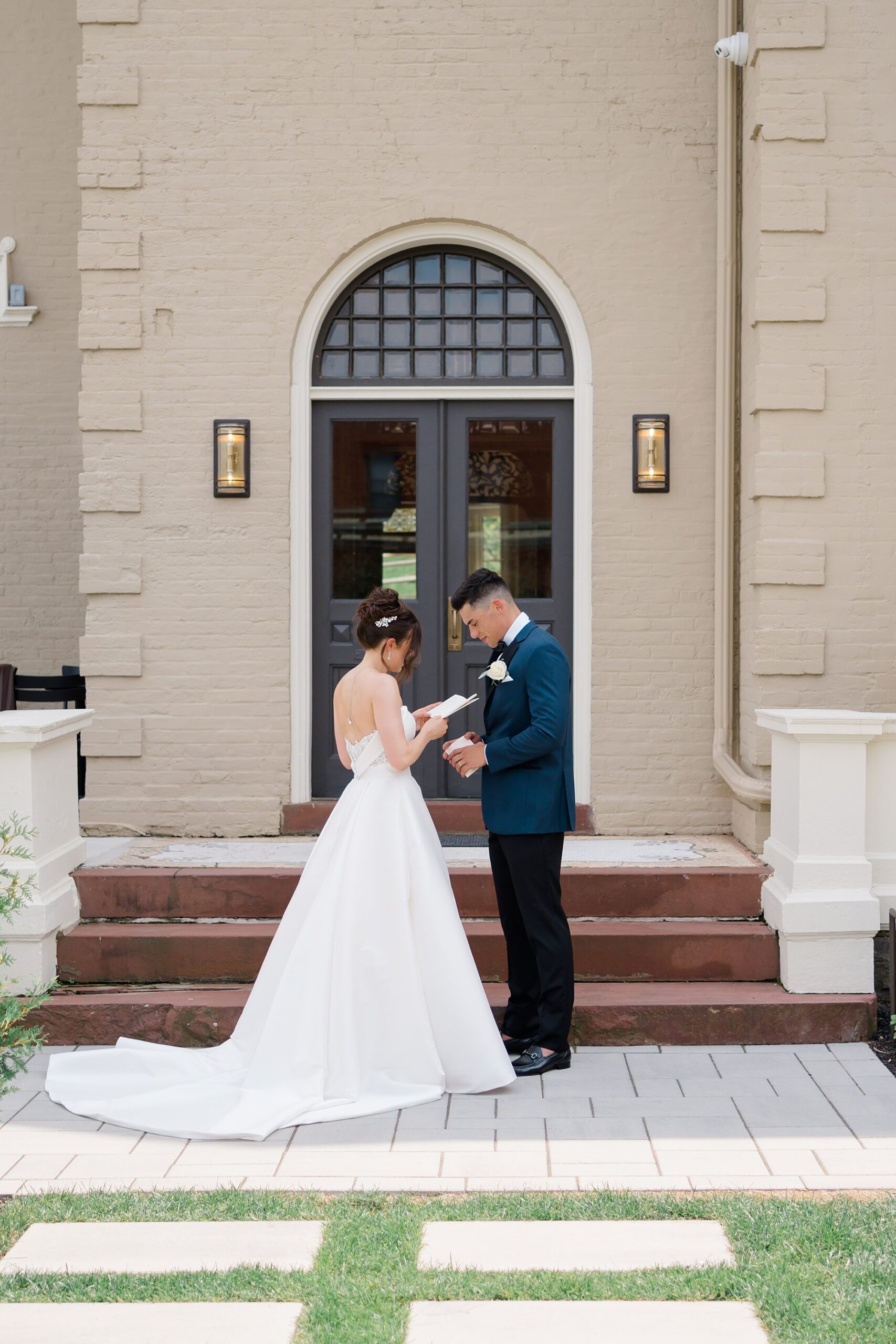 couple exchange private vows outside of Wilbur Mansion