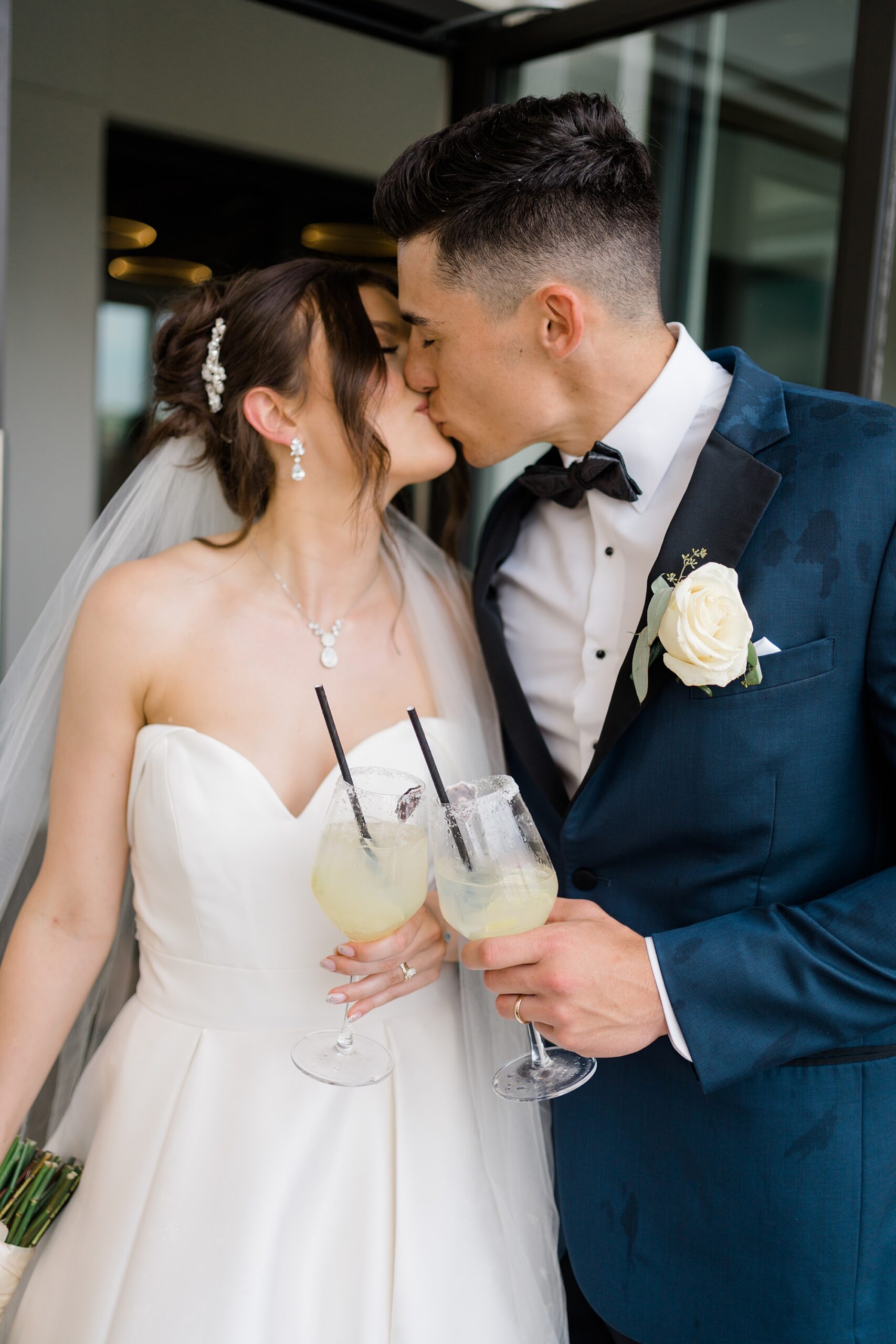 newlyweds kiss during Wilbur Mansion Wedding