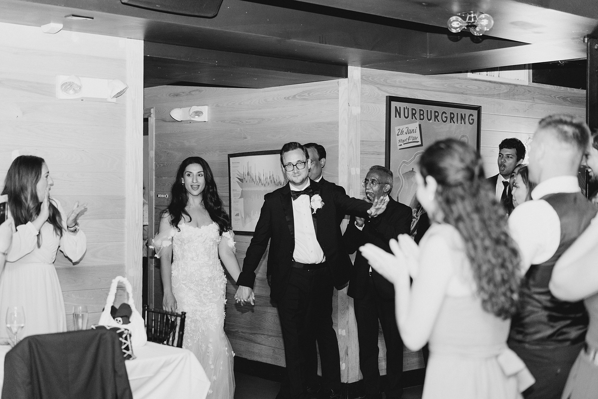 newlyweds enter wedding receptiom at Jockey Hollow Bar and Kitchen 