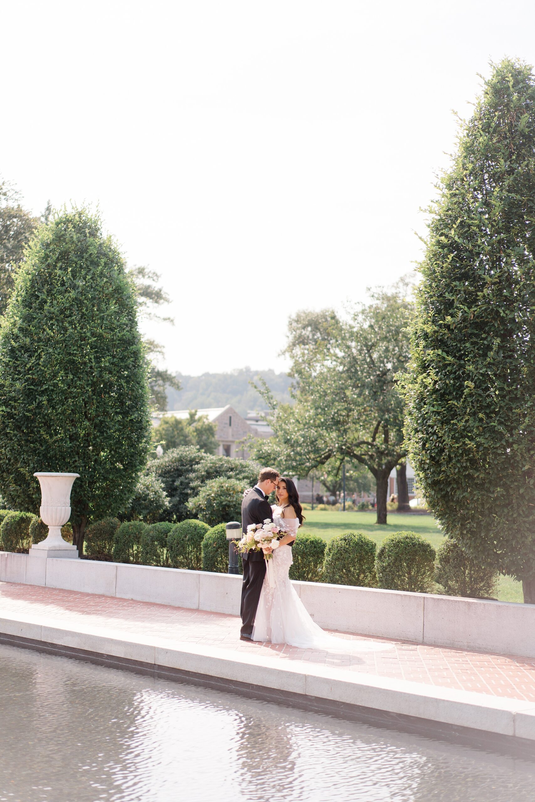 timeless wedding photos by pool and garden