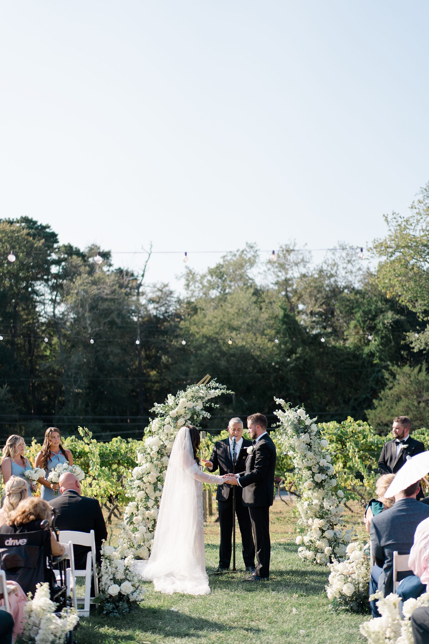outdoor wedding ceremony at Renault Winery in the vineyard