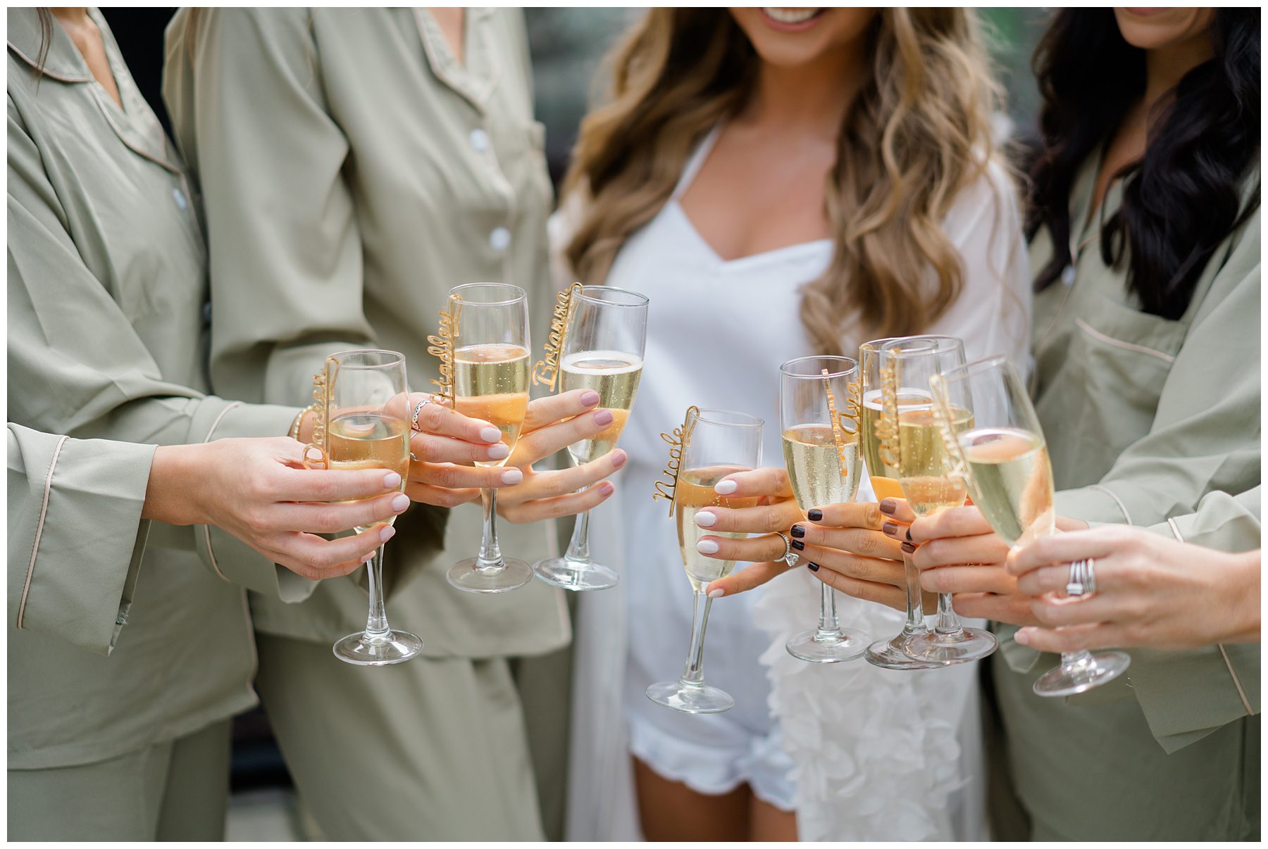 bridesmaids toast with champagne before Indian Trail Club Wedding