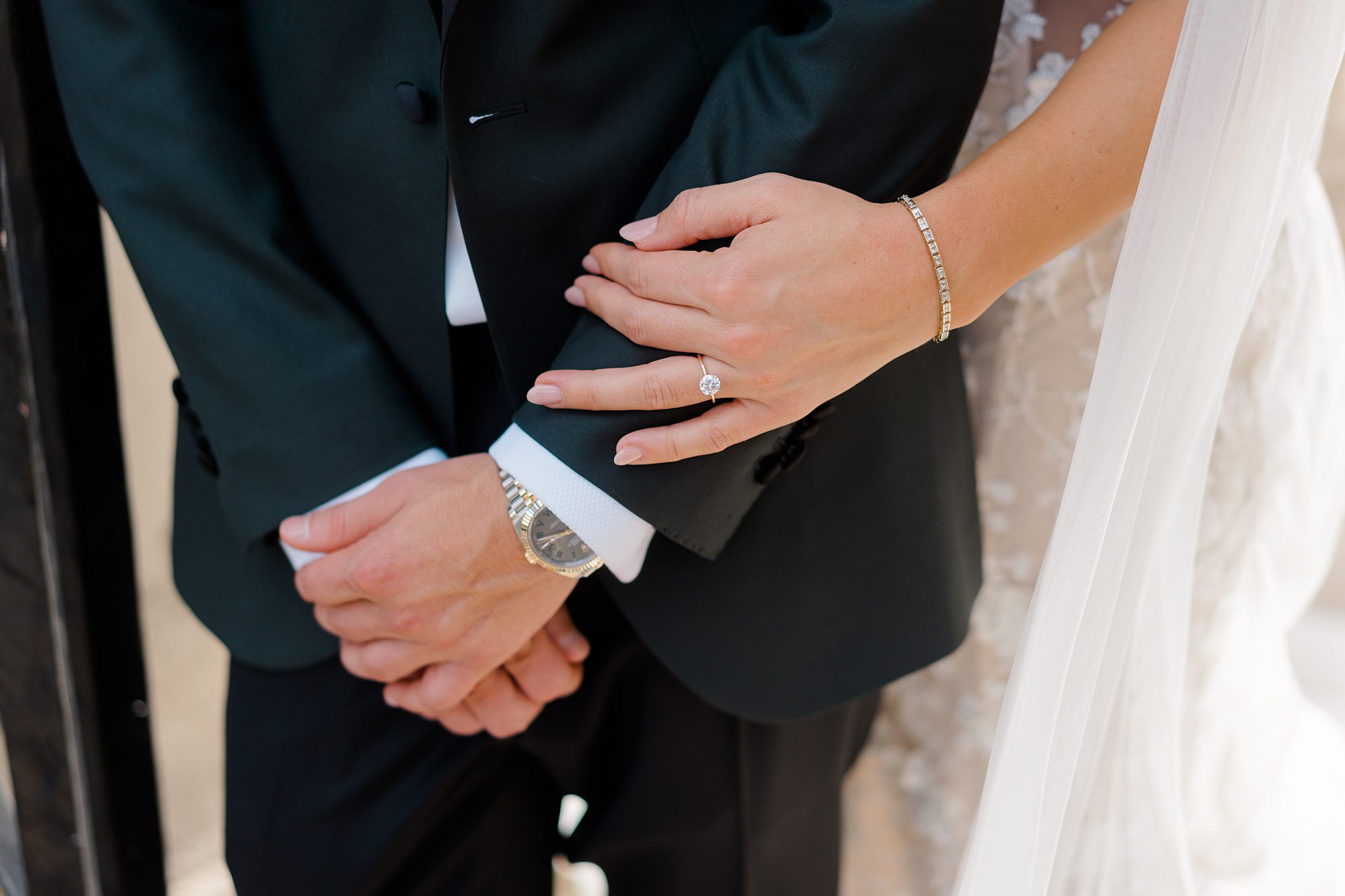 newlyweds with wedding rings on