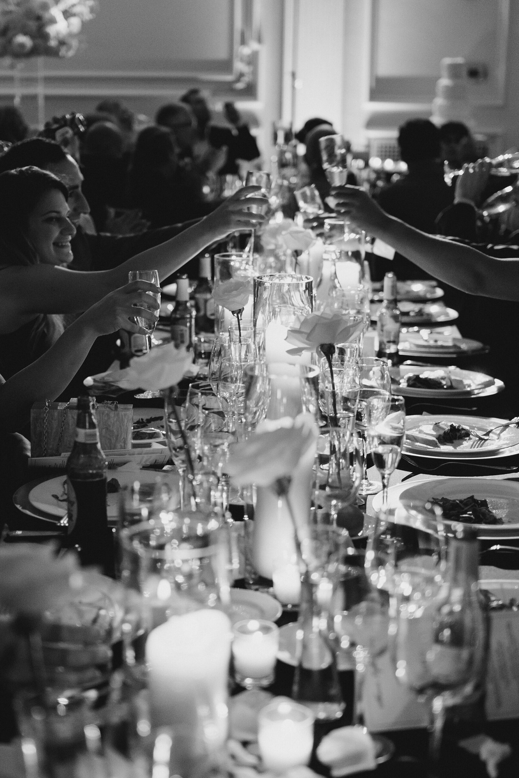 guests toast the newlyweds at Chic Down Town Club Wedding by Cescaphe 