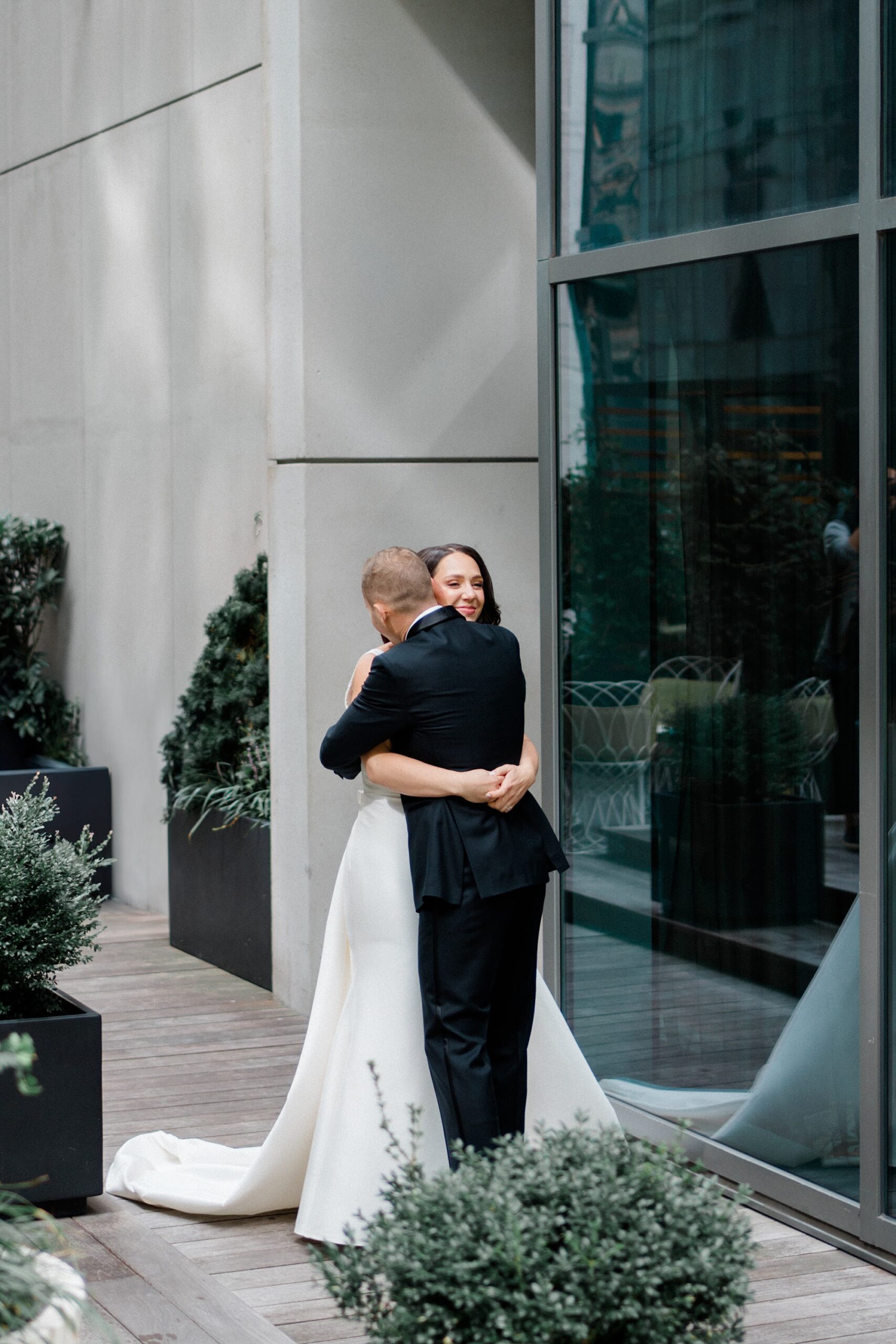 bride and groom hug during first look