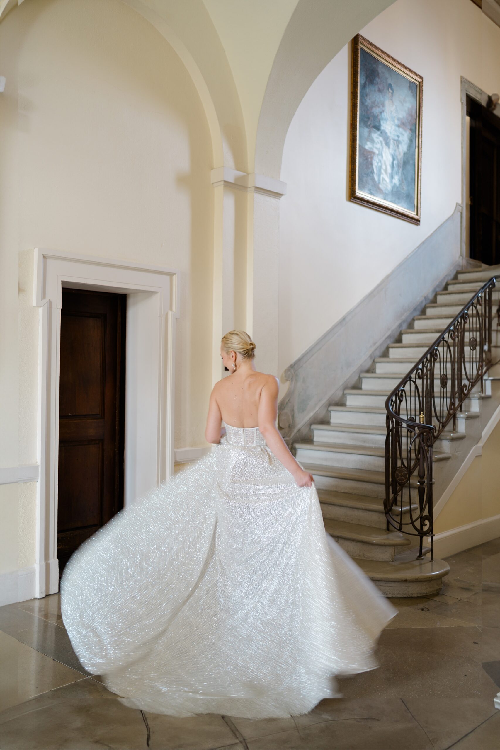 bride twirls in shimmering wedding dress 