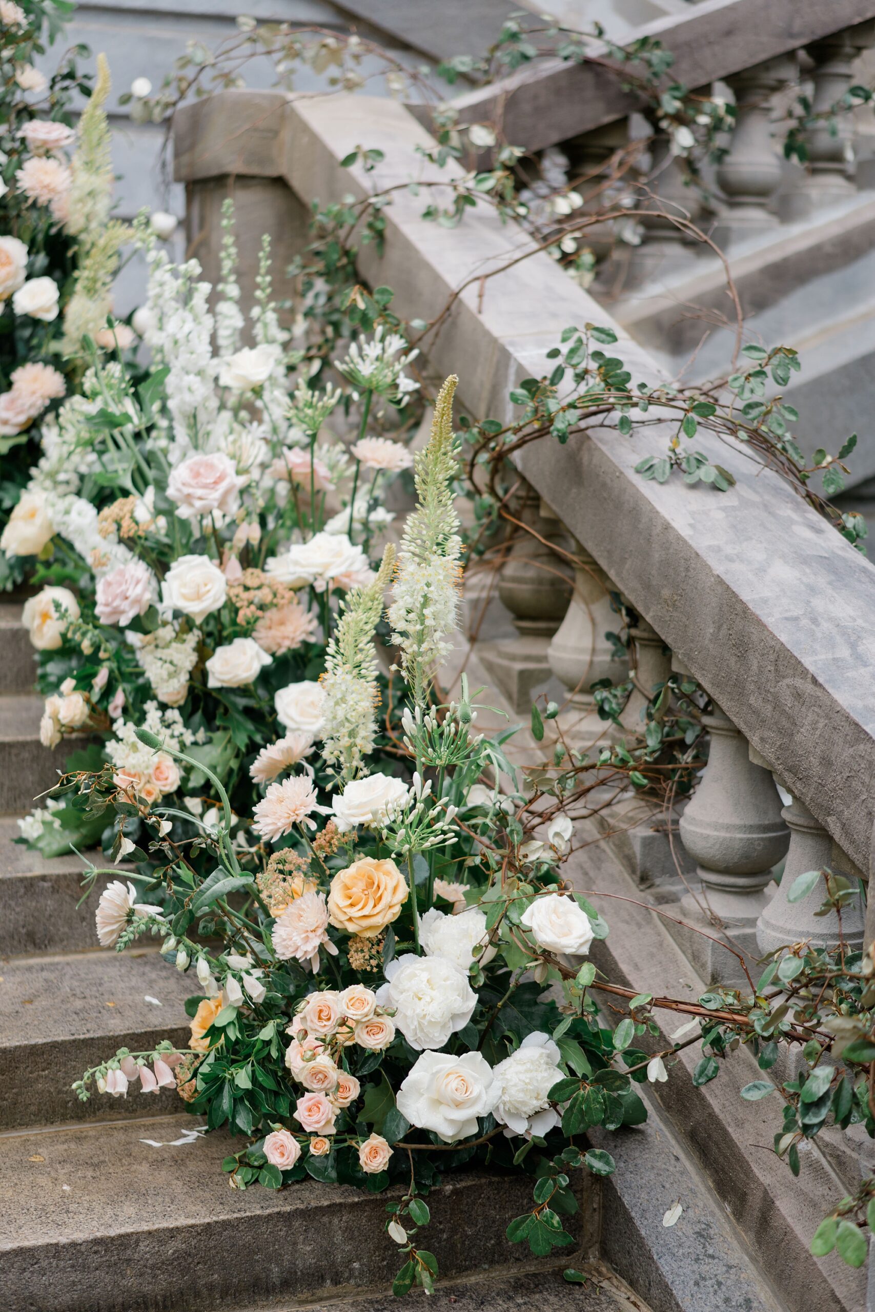 soft florals on steps at Elstowe Manor
