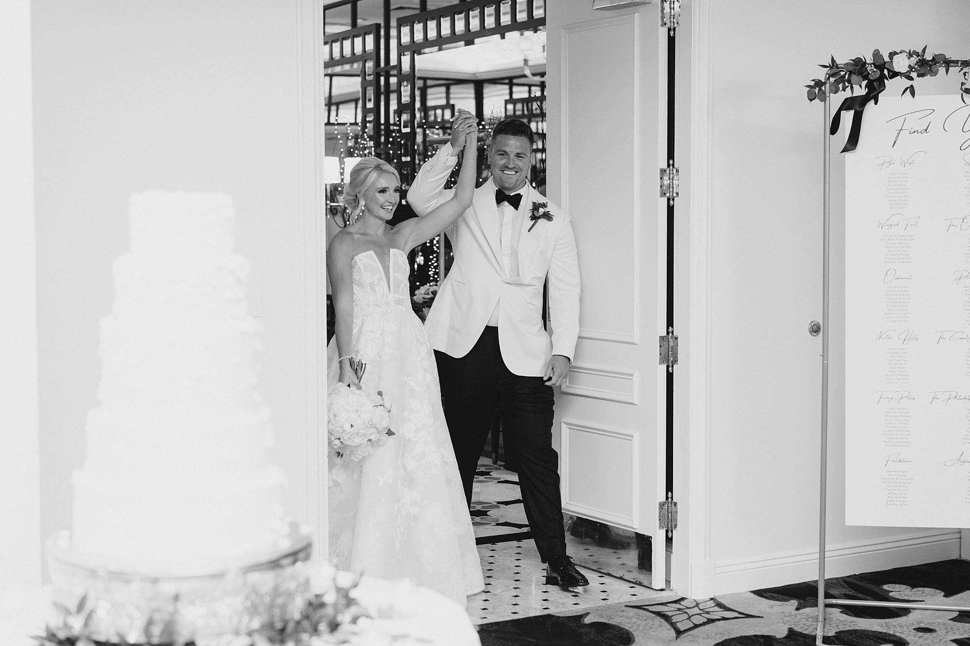 bride and groom enter wedding reception 