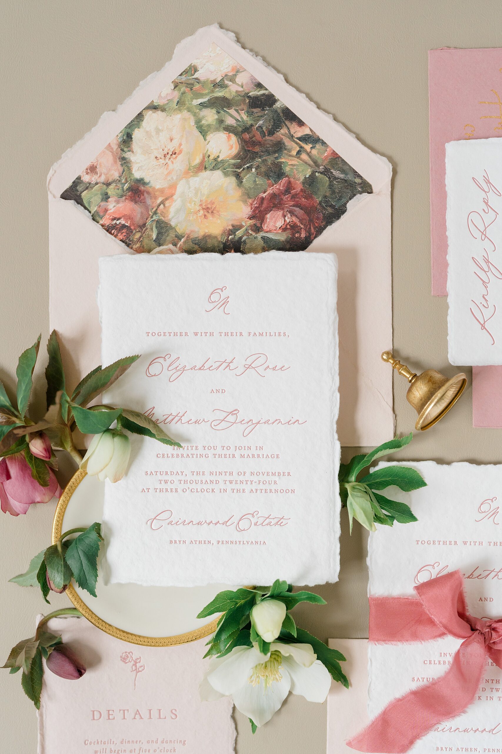 elegant pink and floral wedding stationery 