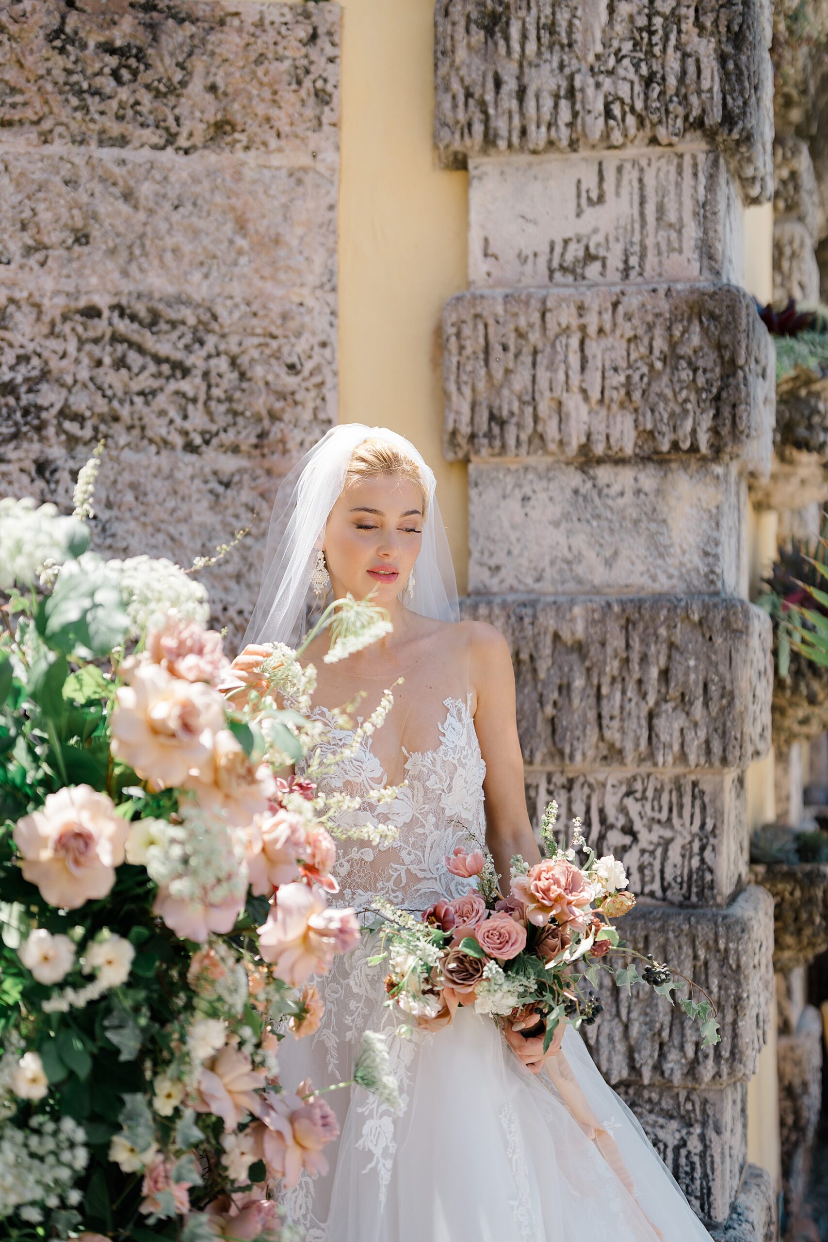 bridal portraits by soft floral display 