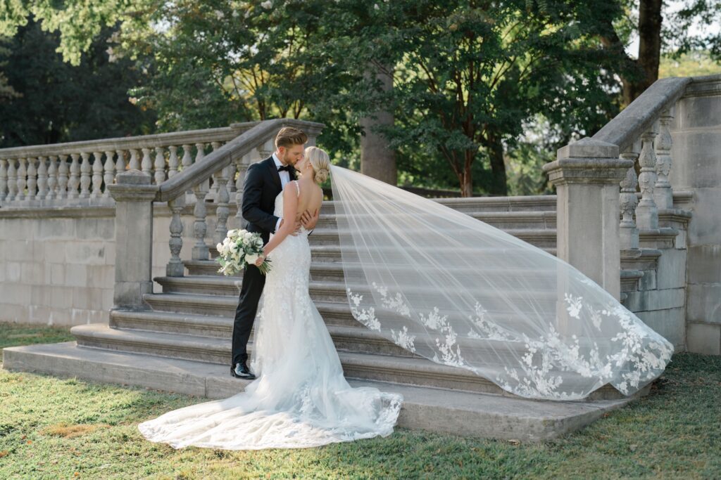 Bride and Groom portraits on stairs at Curtis Arboretum wedding