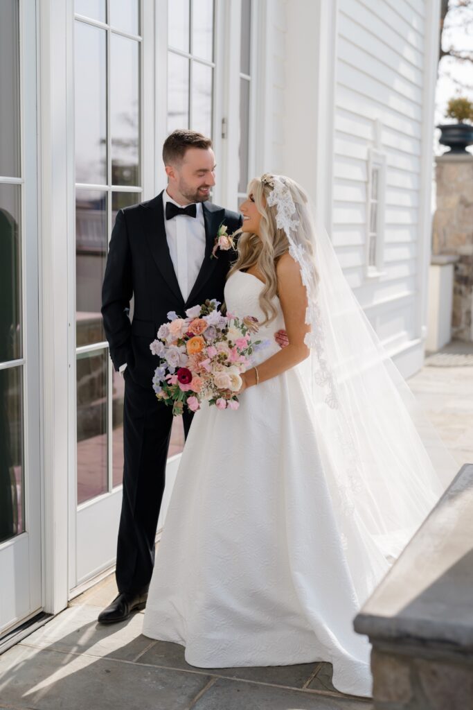bride and groom standing together during portraits at a Ryland Inn Wedding
