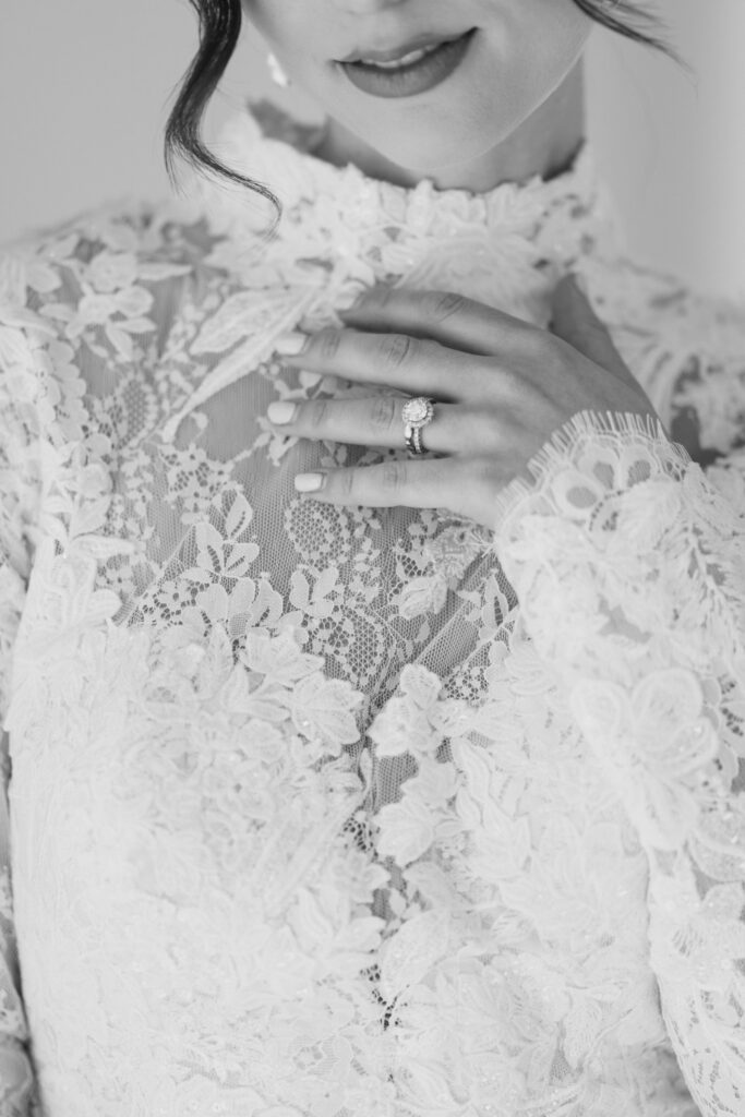 Black and White image of brides lace high neck wedding dress at Crystal Plaza