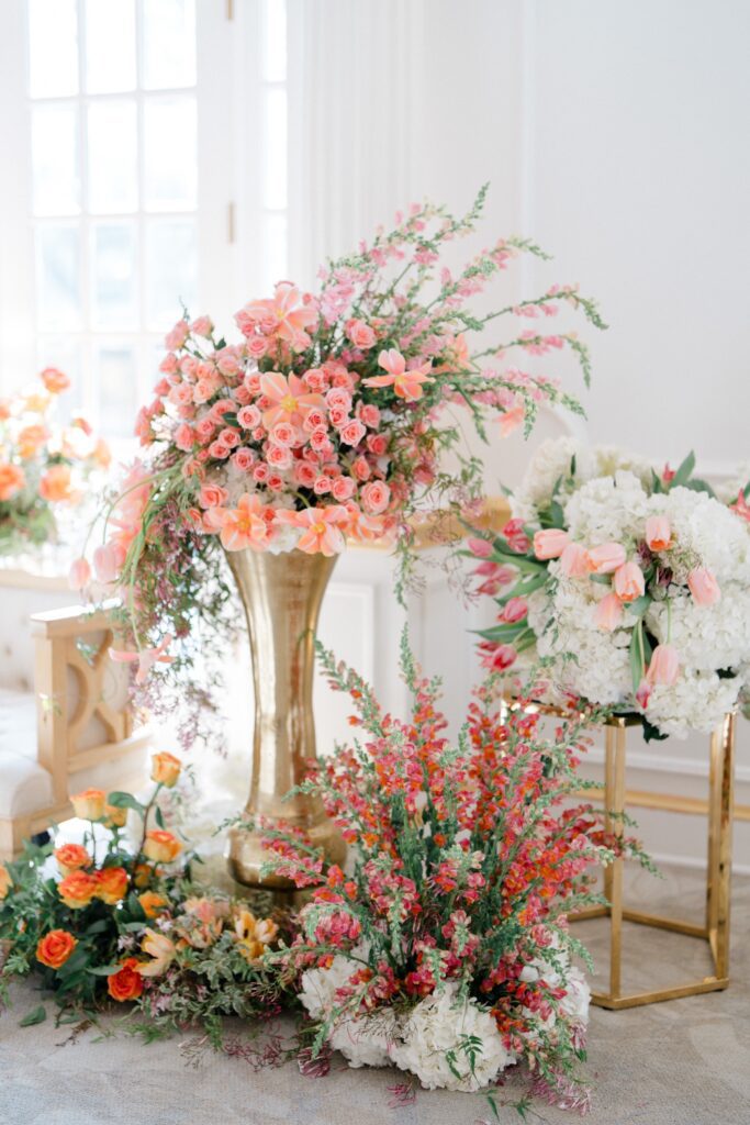 Orange, pink and white florals from at Styled Shoot at Crystal Plaza