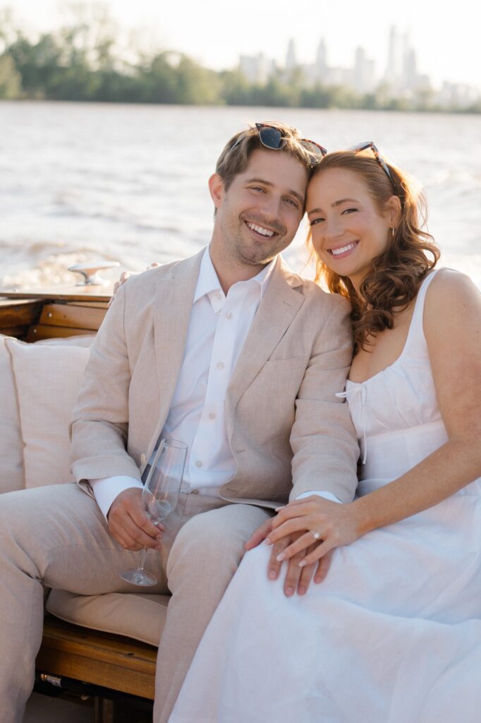 Bride and Groom smiling during sunset engagement session at Sea Philly